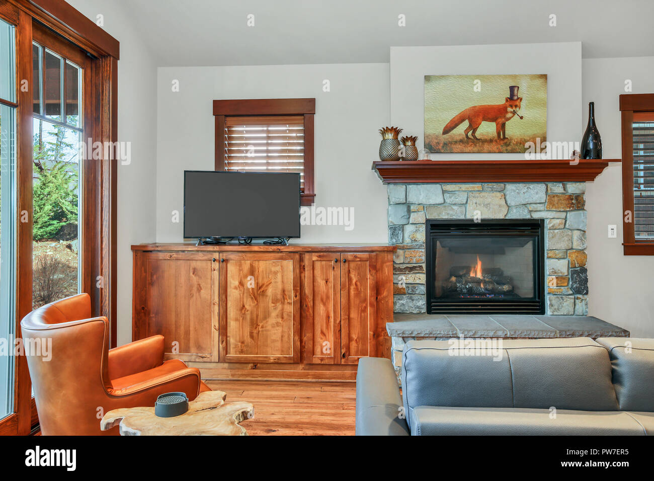 Adorable Living Room Interior With Stone Fireplace Wood Flooring