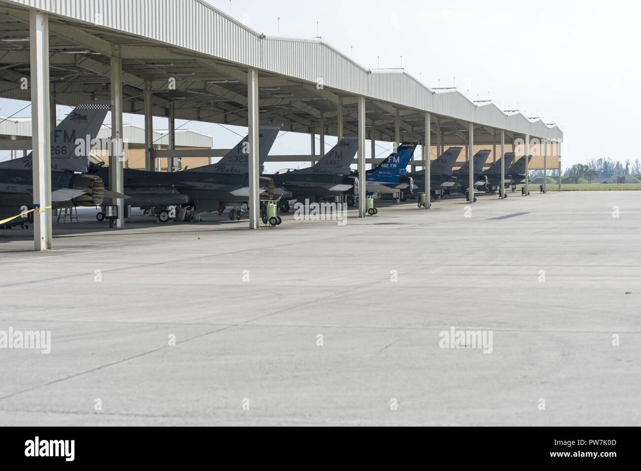 The 482nd Fighter Wing F-16C Vipers are parked at Homestead Air Reserve Base, Florida, after returning home from being evacuated, September 21, 2017. The aircraft of the fighter wing were evacuated to Texas in advance of Hurricane Irma’s landfall with Florida. Stock Photo