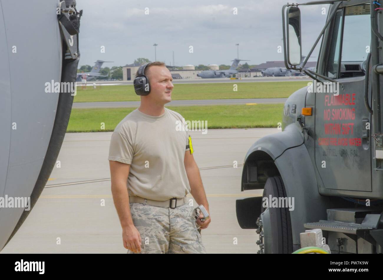 Staff Sergeant Victor Pascale, 108th Petroleum, Oils, and Lubricants shop, watches the gauges as gas is pumped into a KC-135 on the 108th Wing apron at Joint Base McGuire-Dix-Lakehurst, N.J., Sept. 20, 2017. Stock Photo