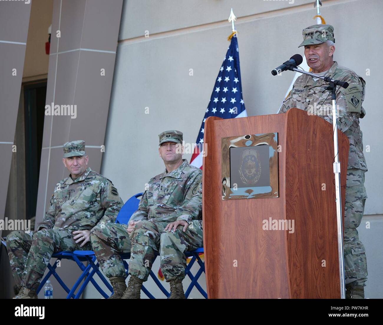 Lt. Gen. Todd Semonite, commanding general, U.S. Army Corps of Engineers, right, speaks to the audience during a Sept. 21 ribbon-cutting ceremony for the new Weed Army Community Hospital, while Gen. Robert Abrams, commanding general, U.S. Army Forces Command, left, and Maj. Gen. Thomas Tempel, commanding general, Regional Health Command-Central, center, look on. Stock Photo