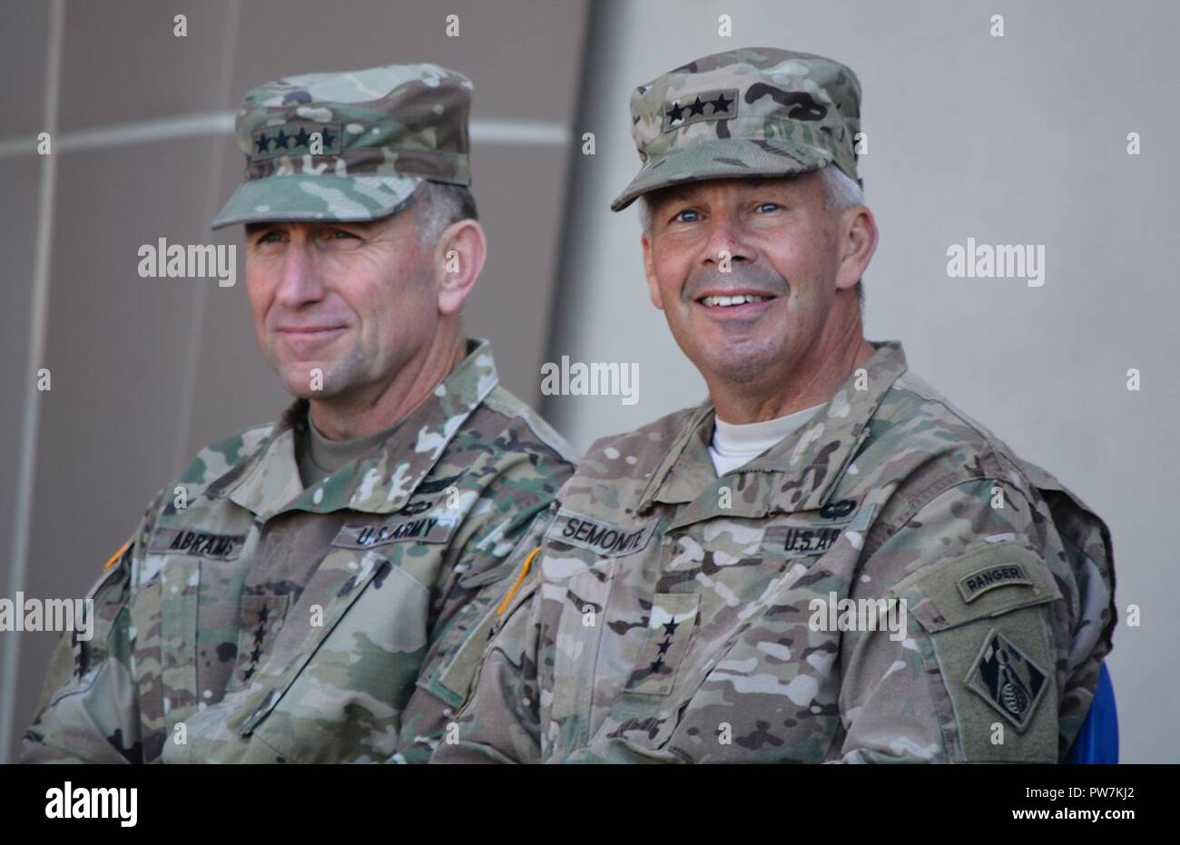 Gen. Robert Abrams, commanding general, U.S. Army Forces Command, left, and Lt. Gen. Todd Semonite, commanding general, U.S. Army Corps of Engineers, right, look out into the audience during a Sept. 21 ribbon-cutting ceremony for the new Weed Army Community Hospital at Fort Irwin, California. Stock Photo