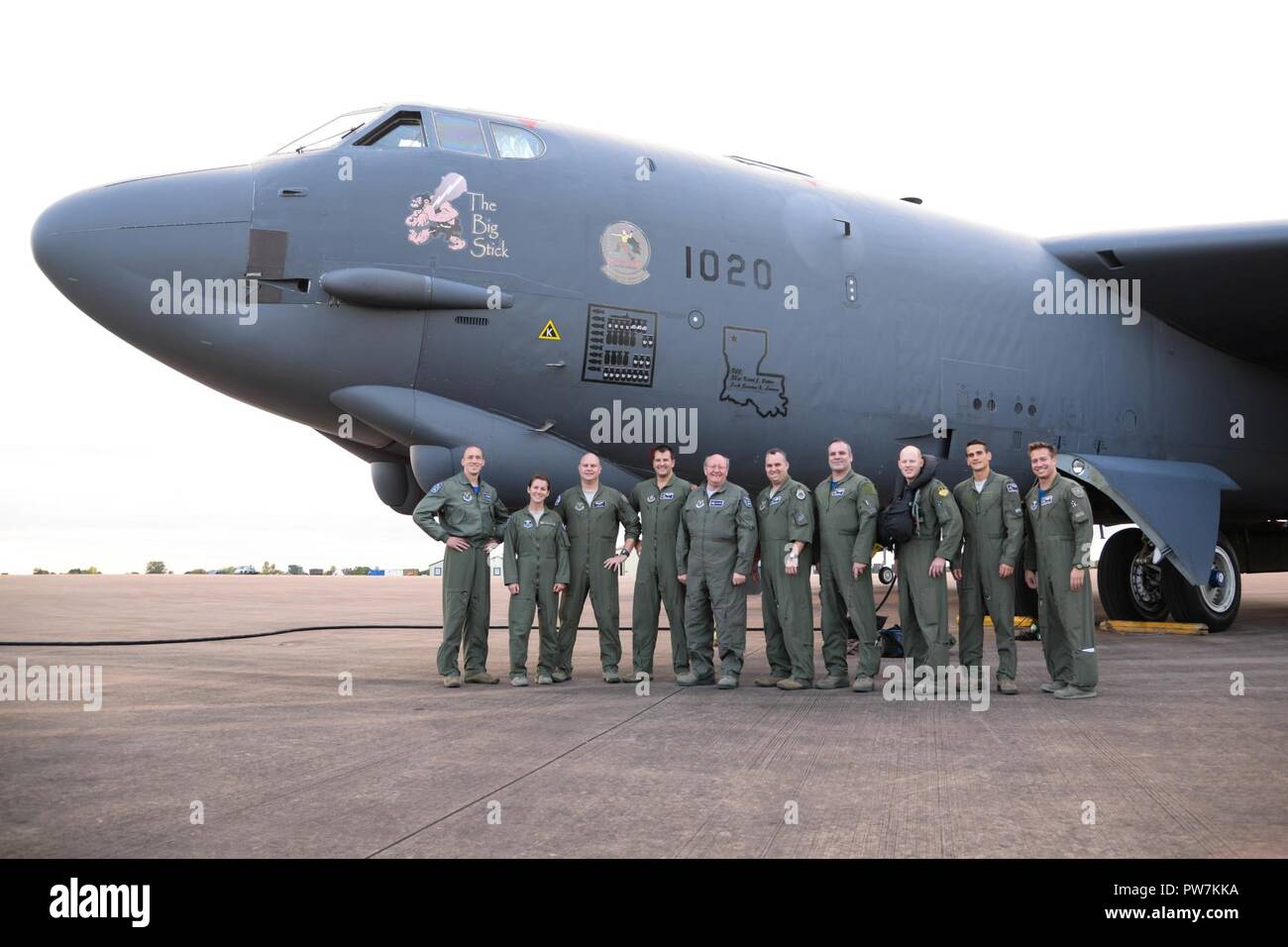 A B-52 Stratofortress aircrew poses for a photo after landing at Fairford Royal Air Force Base, Sept. 22, 2017. The aircrew participated in SERPENTEX 17, a coalition exercise that brought teams together from the U.S., U.K., France and Canada. Stock Photo