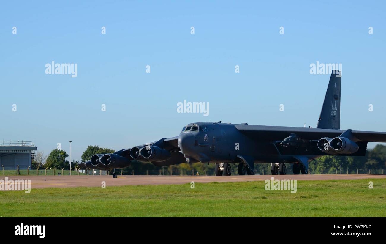 A B-52 Stratofortress taxis for a takeoff at Fairford Royal Air Force Base, Sept. 22, 2017. U.S. Strategic Command bomber forces regularly conduct combined theater security cooperation engagements with allies and partners, demonstrating the U.S. capability to command, control and conduct bomber missions across the globe. Bomber missions demonstrate the credibility and flexibility of the military's forces to address today's complex, dynamic and volatile global security environment. Stock Photo