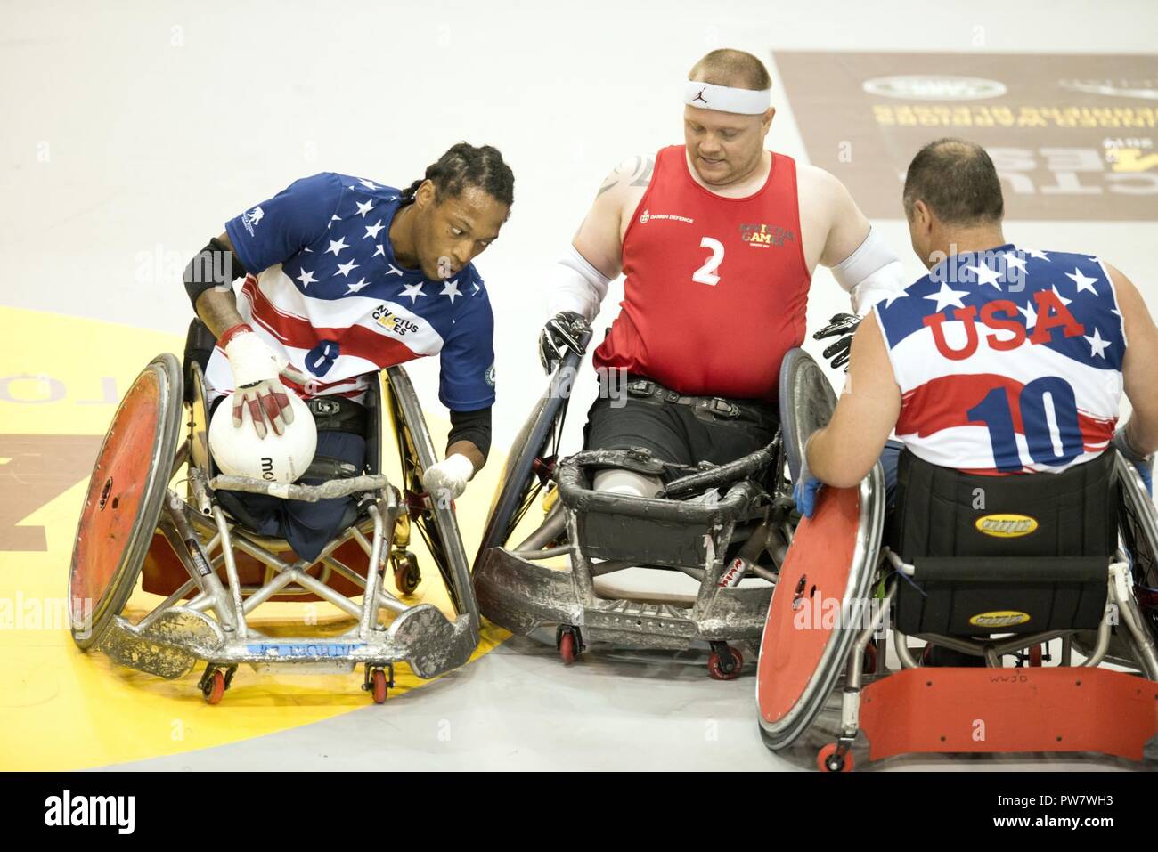 U.S. Marine veteran Sgt. Anthony McDaniel, left, competes in wheelchair rugby during the 2017 Invictus Games at the Mattamy Athletic Centre in Toronto, Ontario, September 28, 2017. The Invictus Games, established by Prince Harry in 2014, brings together wounded and injured veterans from 17 nations for 12 adaptive sporting events, including track and field, wheelchair basketball, wheelchair rugby, swimming, sitting volleyball, and new to the 2017 games, golf. Stock Photo