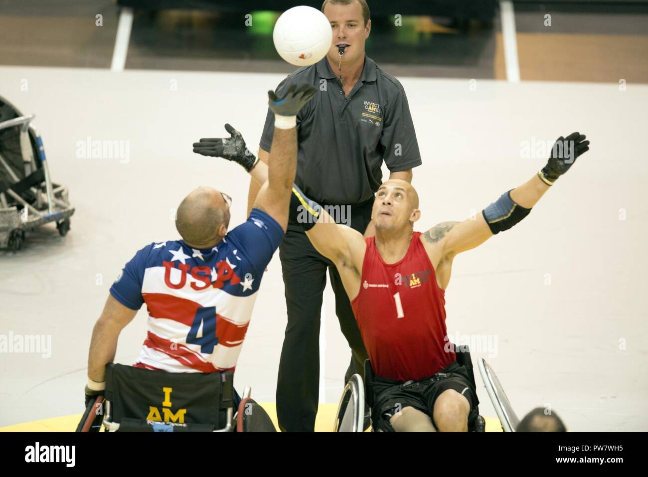 U.S. Air Force Tech. Sgt. Jason Caswell, left, competes in wheelchair rugby during the 2017 Invictus Games at the Mattamy Athletic Centre in Toronto, Ontario, September 28, 2017. The Invictus Games, established by Prince Harry in 2014, brings together wounded and injured veterans from 17 nations for 12 adaptive sporting events, including track and field, wheelchair basketball, wheelchair rugby, swimming, sitting volleyball, and new to the 2017 games, golf. Stock Photo