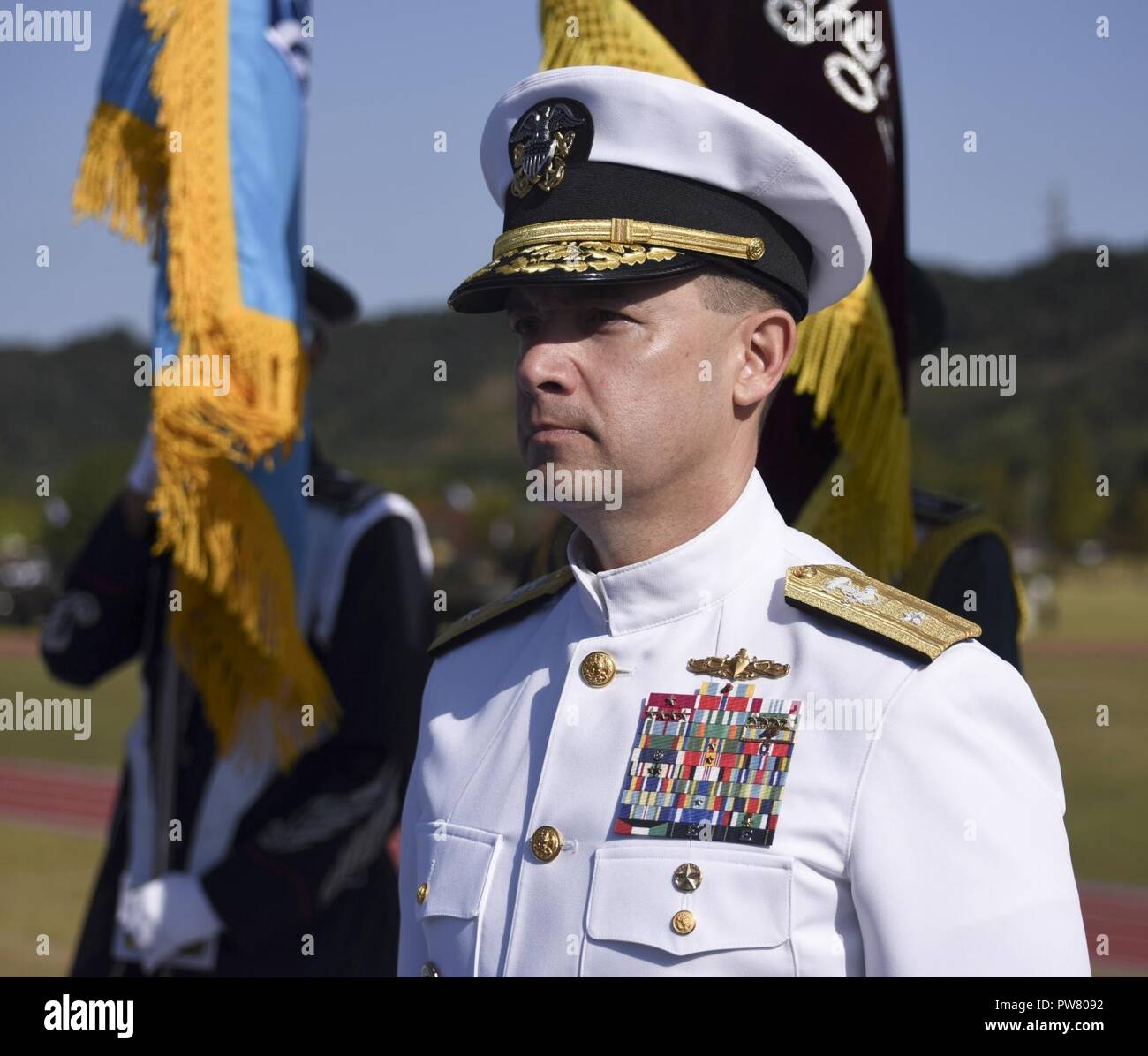 PYEONGTAEK, Republic of Korea (Sept. 28, 2017) Rear Adm. Brad Cooper, commander, Naval Forces Korea (CNFK) stands during the 69th annual ROK Armed Forces Day Ceremony. Armed Forces Day commemorates the service of men and women in the ROK armed forces, the day that South Korea broke through the 38th parallel during the Korean War in 1950. Cooper is also presented the Presidential Unit Citation by ROK President Moon, Jae-in, this is the first time a U.S. Navy command is presented this award since the end of the Korean War. Stock Photo