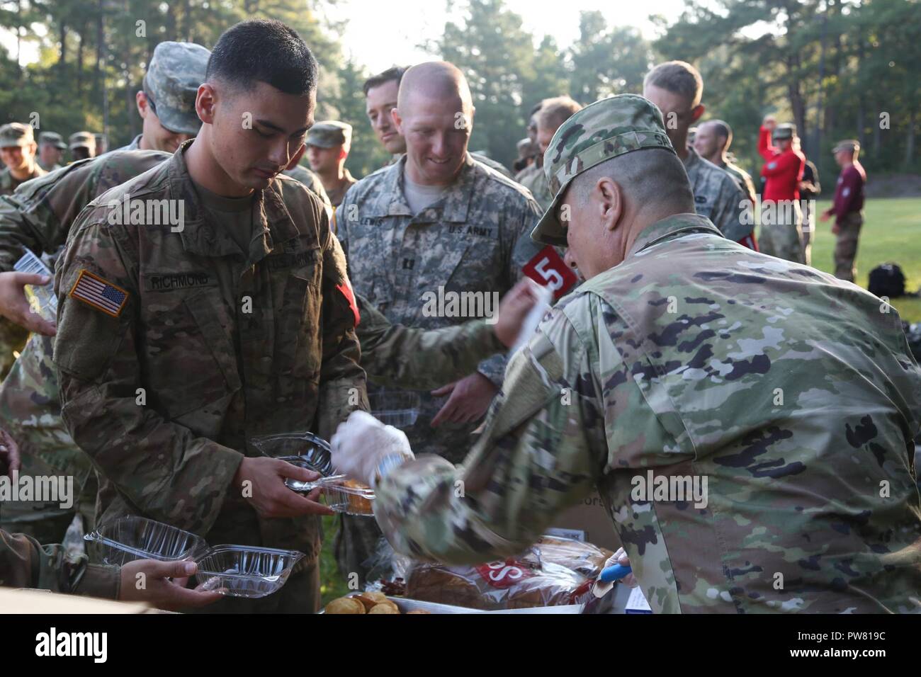 U.S. Army Sgt. Kevin Richmond, assigned to Martin Army Community Hospital, gets served a hot breakfast after the 2017 Best Medic Competition at Fort Bragg, N.C., Sept. 20, 2017. The competition tested the physical and mental toughness, as well as the technical competence, of each medic to identify the team moving forward to represent the region at the next level of the competition. Stock Photo