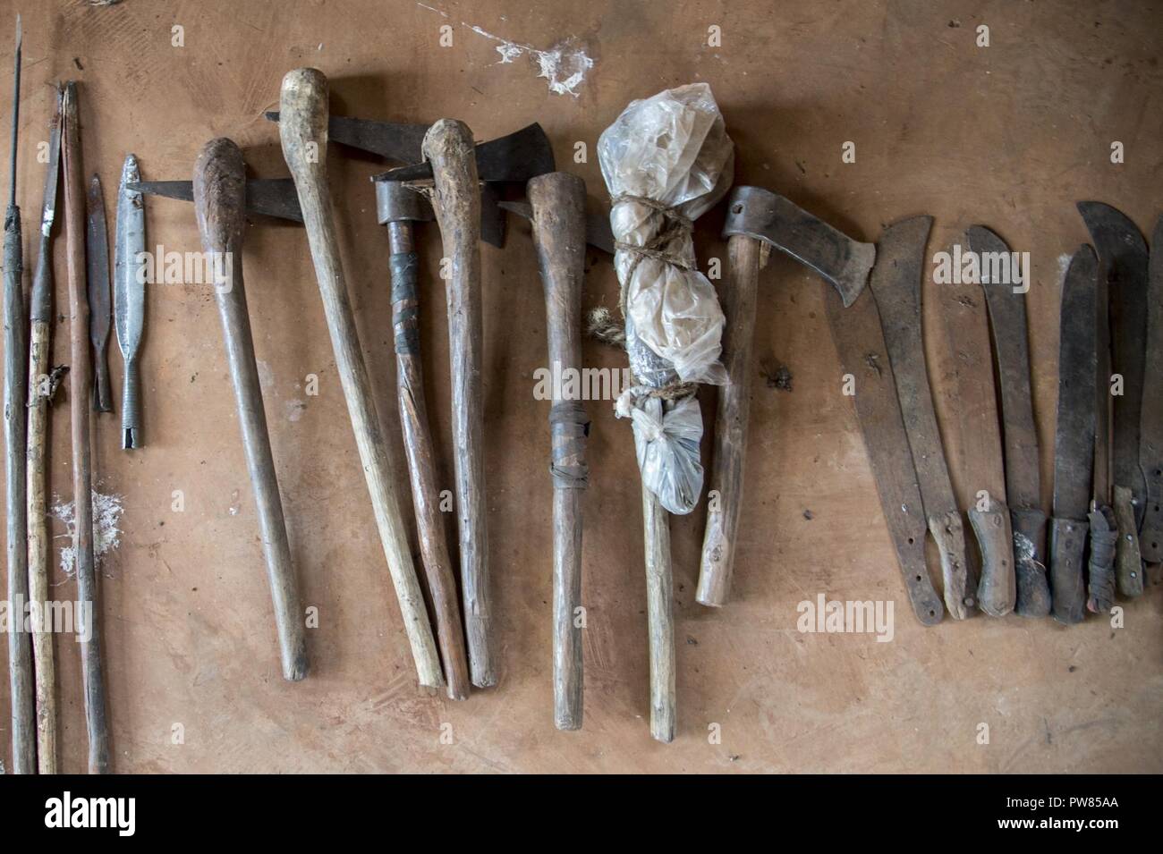 Tanzanian Wildlife Authority game wardens display items Sept. 28, 2017,  that they have confiscated while protecting a game reserve in Tanzania.  Civil affairs Soldiers of Combined Joint Task Force-Horn of Africa are