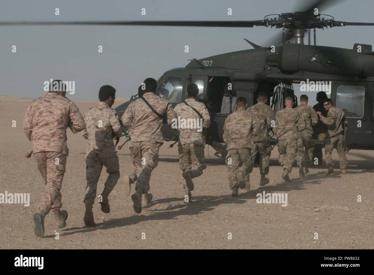Soldiers From The 2nd Battalion 7th Cavalry Regiment Ghost 3rd Armored Brigade Combat Team 1st Cavalry Division And Kuwait S 55th Battalion 26th Brigade The Wall Brigade Practice Mounting And Dismounting A Uh 60