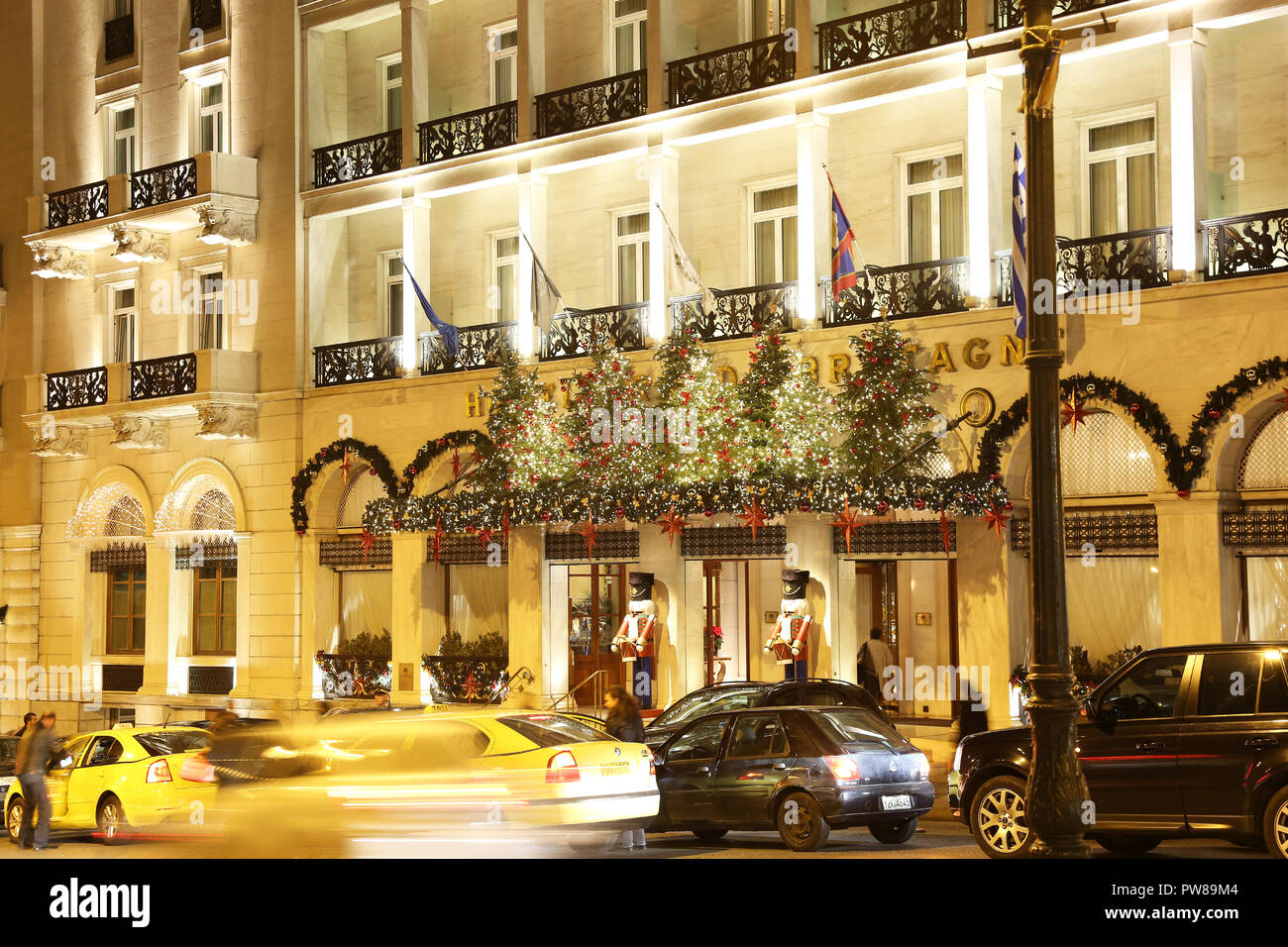 night photography of Grande Bretagne hotel Athens Greece with Christmas decorative lights Stock Photo