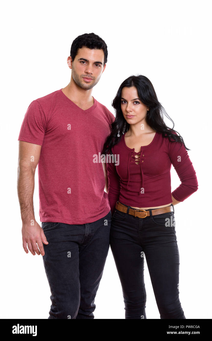 Studio shot of young couple standing together in love Stock Photo