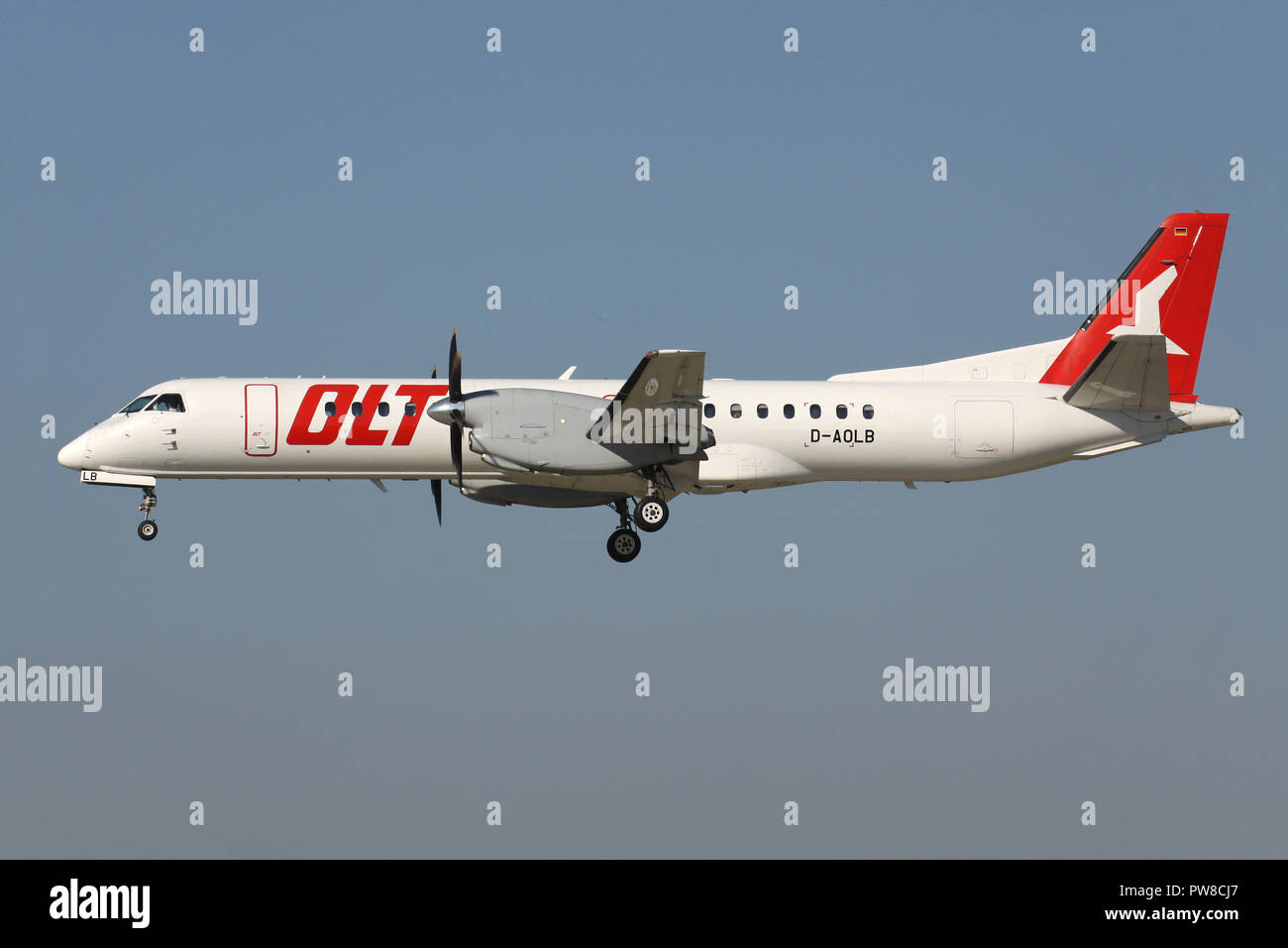 German OLT Saab 2000 with registration D-AOLB on short final for runway 14 of Zurich Airport. Stock Photo