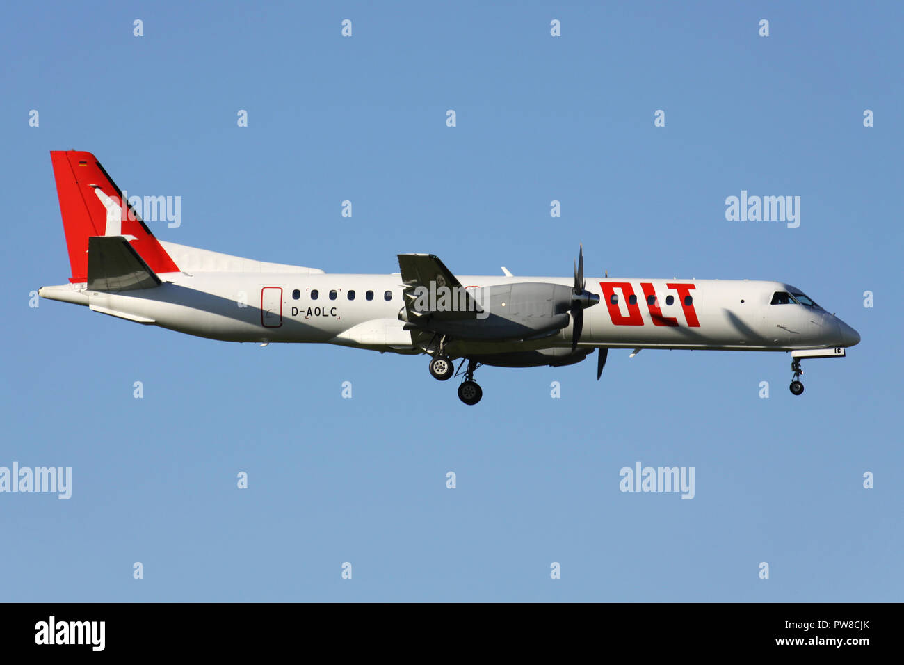 German OLT Saab 2000 with registration D-AOLC on short final for runway 14 of Zurich Airport. Stock Photo