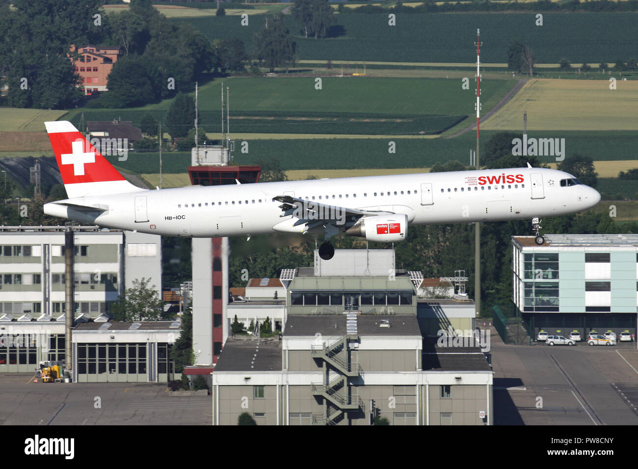 Swiss International Air Lines Airbus A321-100 (old livery) with registration HB-IOC on short final for runway 34 of Zurich Airport. Stock Photo