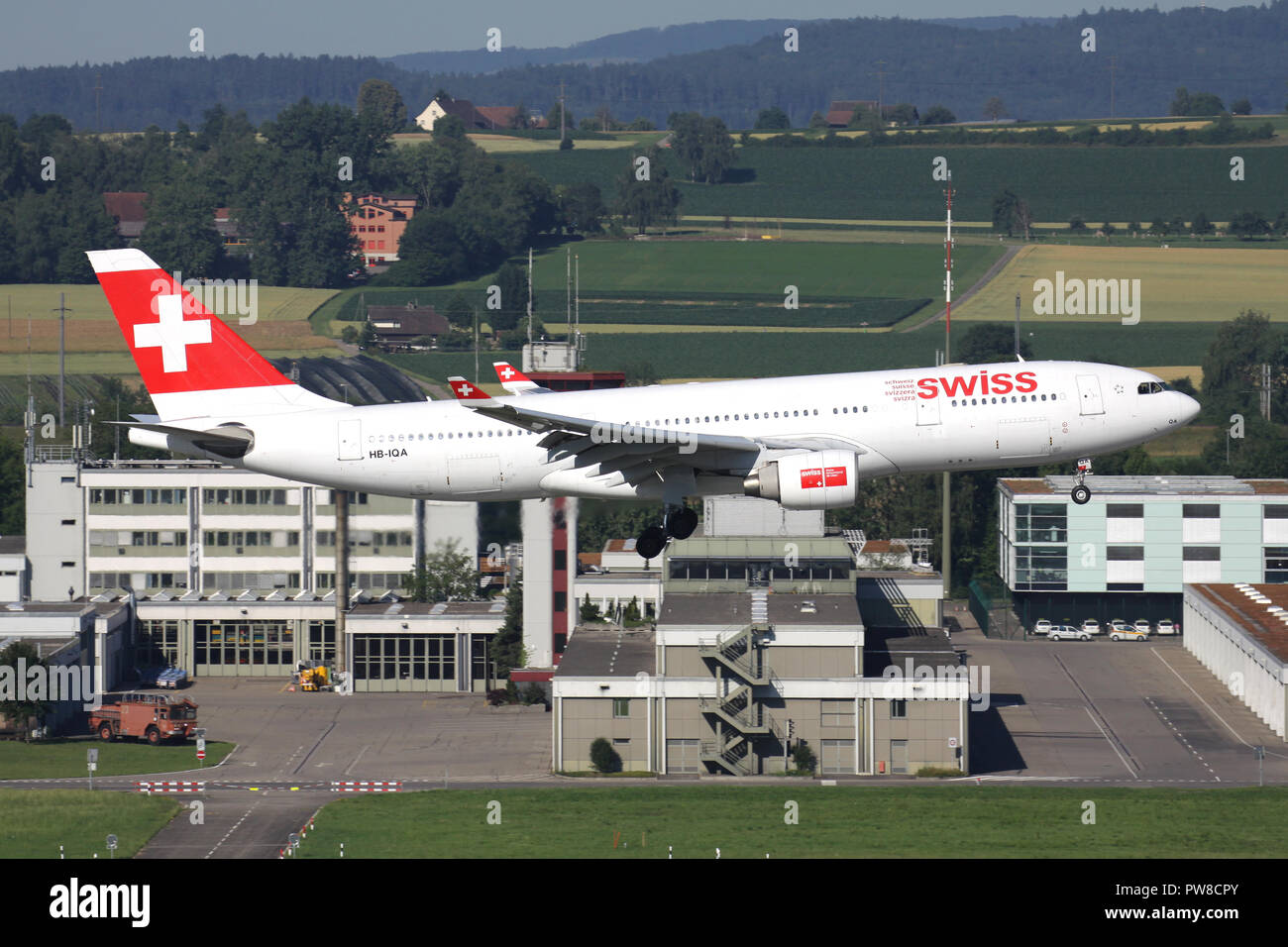 Swiss International Air Lines Airbus A330-200 (old livery) with registration HB-IQA on short final for runway 34 of Zurich Airport. Stock Photo