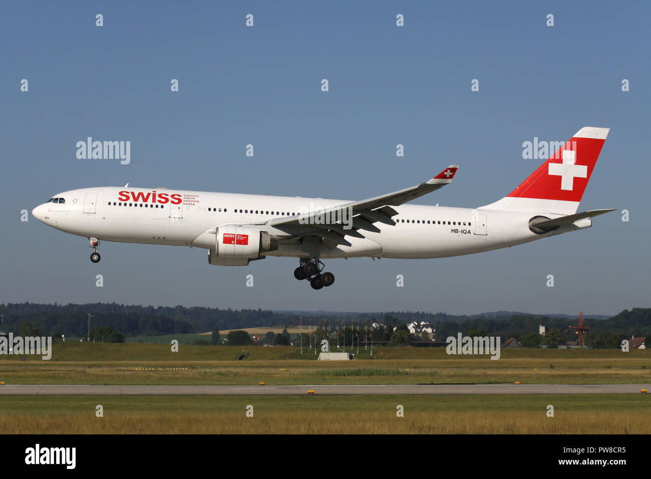 Swiss International Air Lines Airbus A330-200 (old livery) with registration HB-IQA on short final for runway 14 of Zurich Airport. Stock Photo