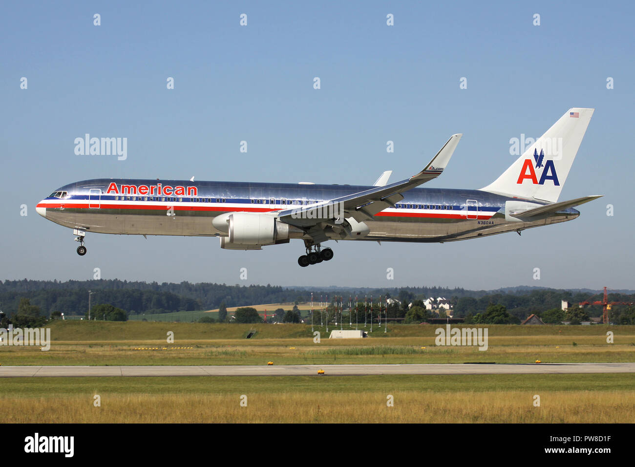 American Airlines Boeing 767-300 (old livery) with registration N360AA on short final for runway 14 of Zurich Airport. Stock Photo