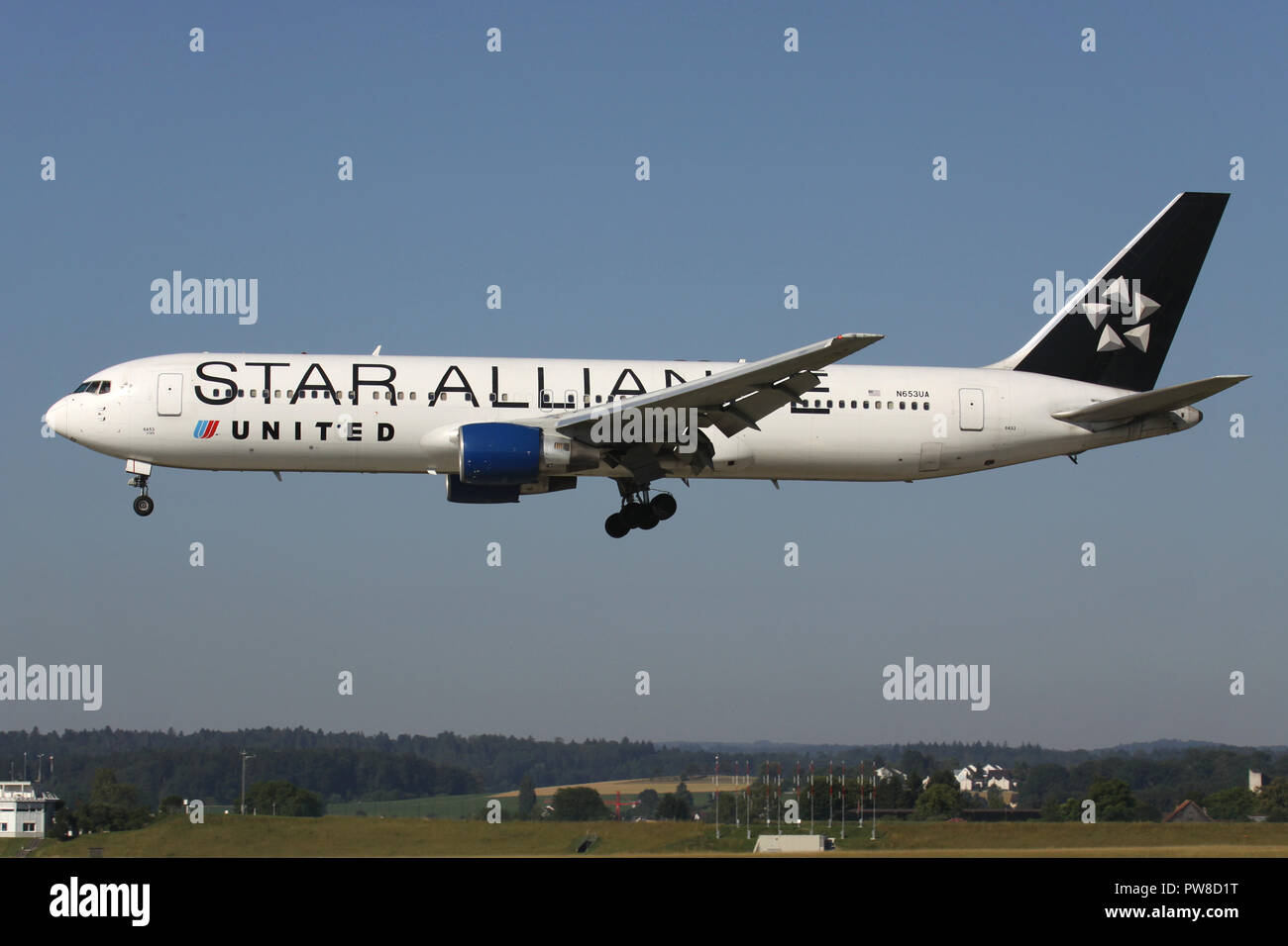 United Airlines Boeing 767-300 in Star Alliance livery with registration N653UA on short final for runway 14 of Zurich Airport. Stock Photo