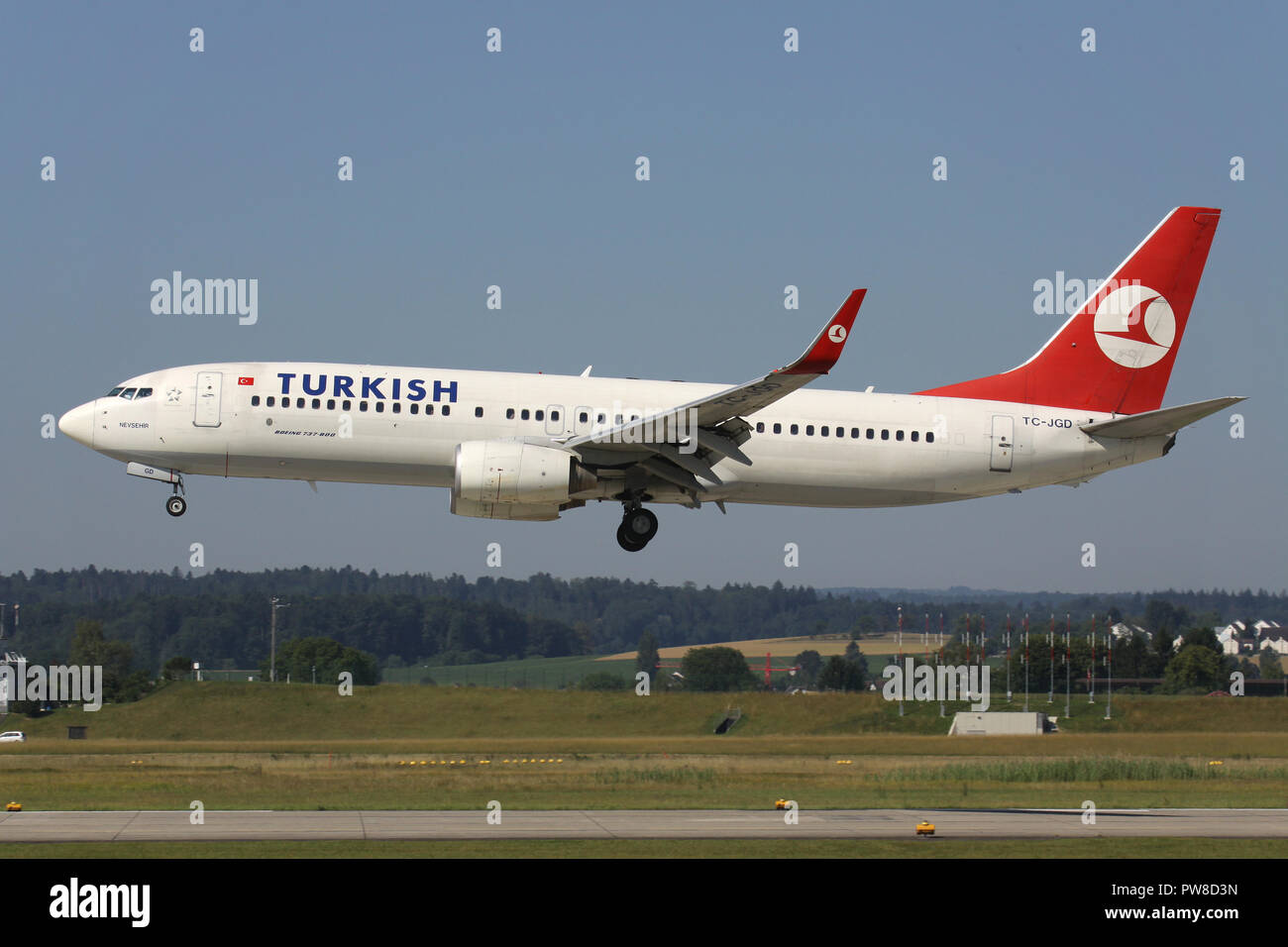 Turkish Airlines Boeing 737-800 (old livery) with registration TC-JGD on short final for runway 14 of Zurich Airport. Stock Photo