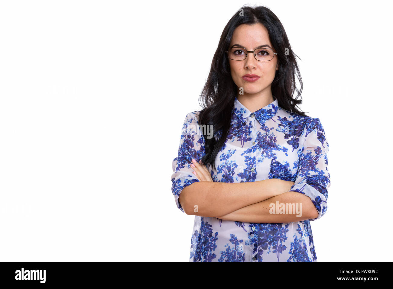 Studio shot of young beautiful Spanish businesswoman wearing eye Stock