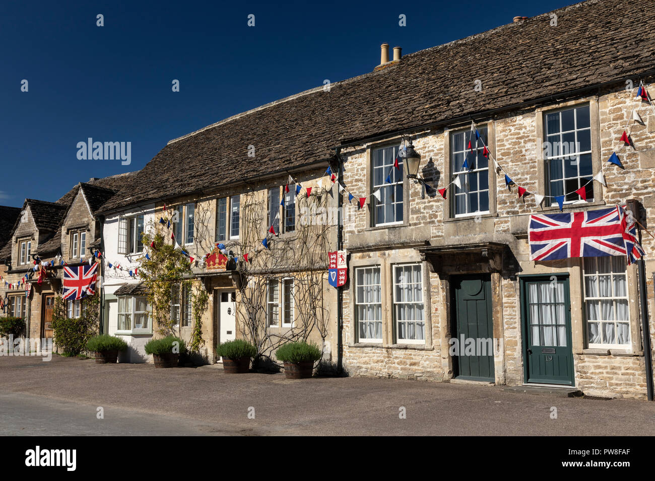 Lacock village High Street transformed back to the 1920s for the filming of Downton Abbey, Wiltshire, England, UK Stock Photo