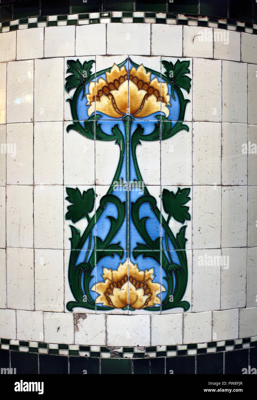 An Art Nouveau motif on tiles in the Lion Tavern, Moorfields, Liverpool. Stock Photo