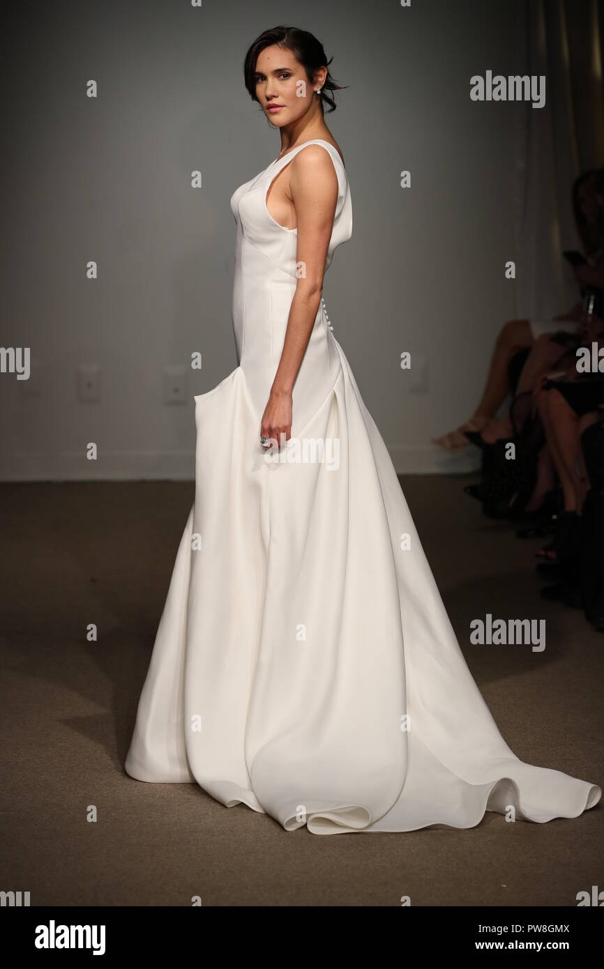 NEW YORK, NY - APRIL 14: A model walks the runway during the Anna Maier / Ulla-Maija Spring 2019  Bridal fashion show on April 14, 2018 in New York Ci Stock Photo