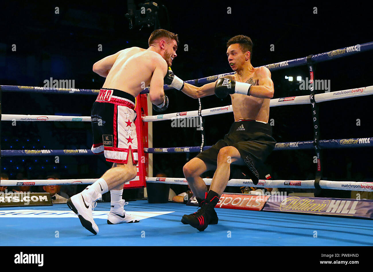 Thomas Ward (left) and Tom Tran compete in the Super-Bantamweight contest at Metro Radio Arena, Newcastle. Stock Photo