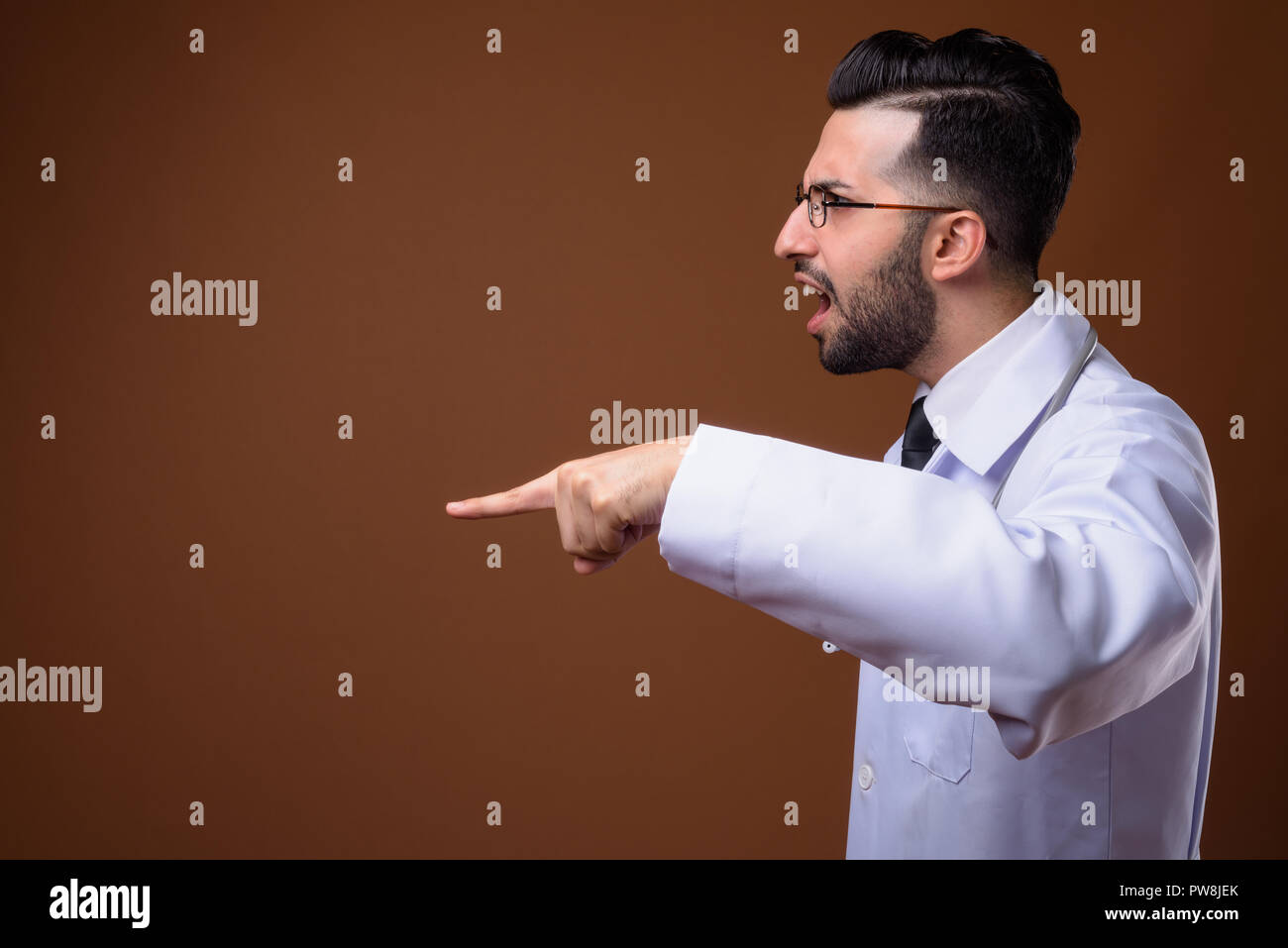 Angry pointing doctor young man hi-res stock photography and images - Alamy