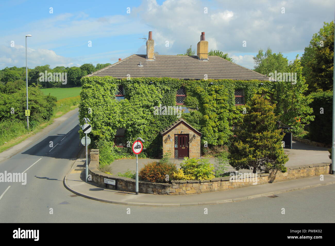 Bridge Farm Hotel covered in Ivy. Swillington,Leeds,West Yorkshire