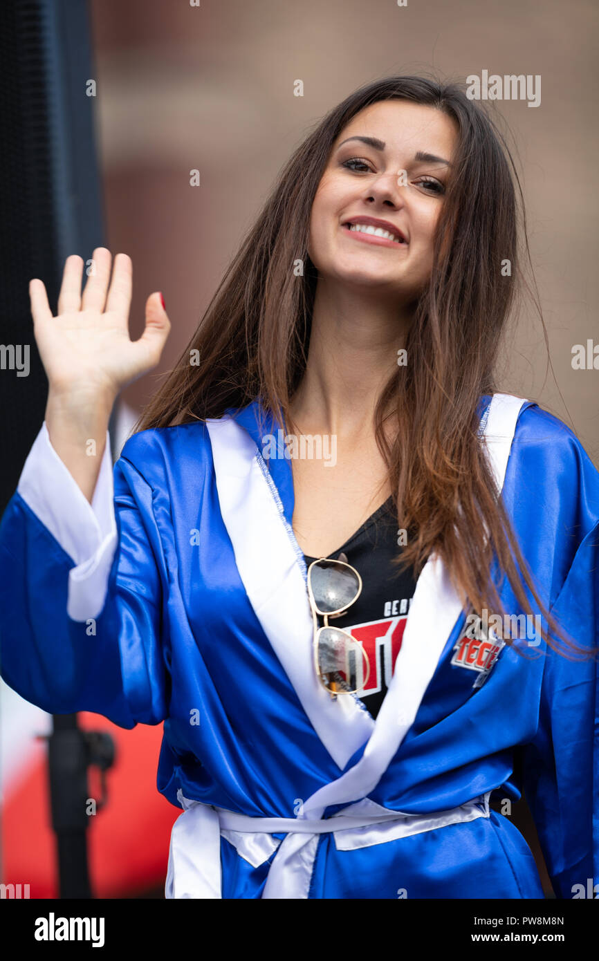Chicago, Illinois , USA - September 9, 2018 The 26th Street Mexican Independence Parade, young woman on top of a float promoting the beer brand Tecate Stock Photo