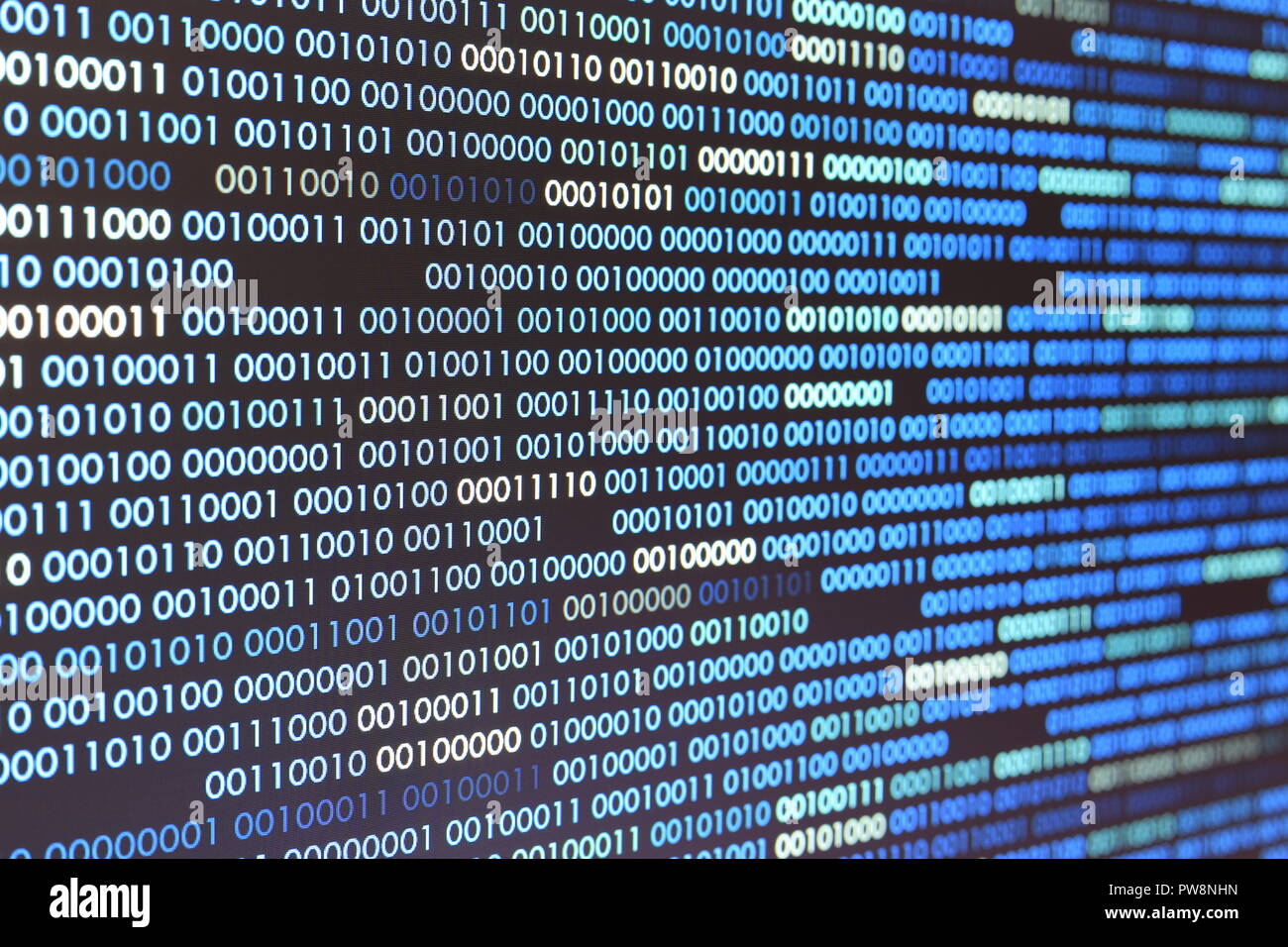 Big overload blockchain data. Blue binary data code background for internet and cyberspace security function. one and zero text on LED moniter screen. Stock Photo