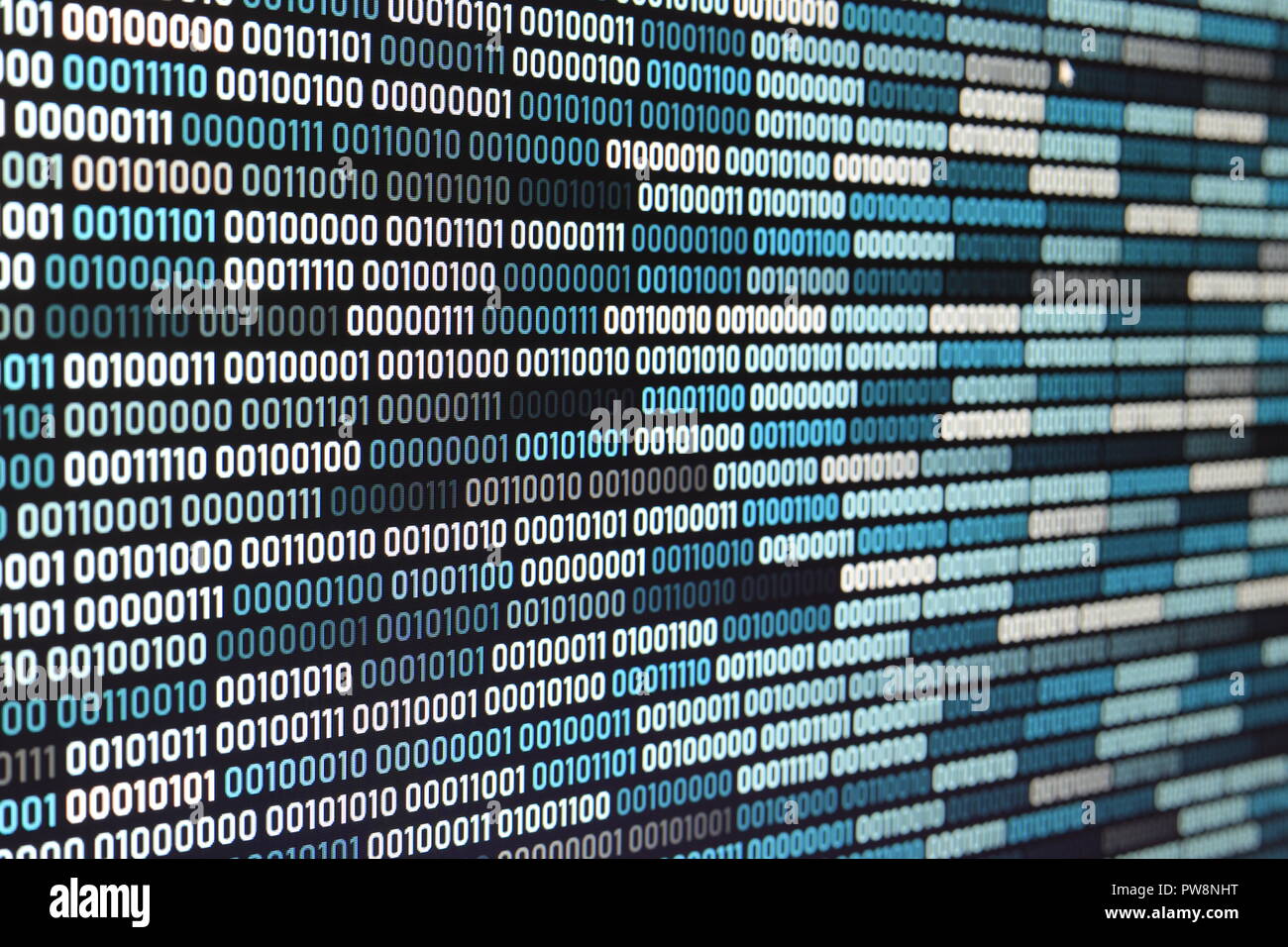 Big overload blockchain data. Blue binary data code background for internet and cyberspace security function. one and zero text on LED moniter screen. Stock Photo