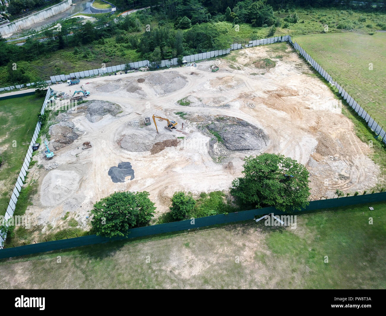 Drone aerial landscape of a construction site, with the full suite of construction equipment at Old Holland, Singapore. Stock Photo