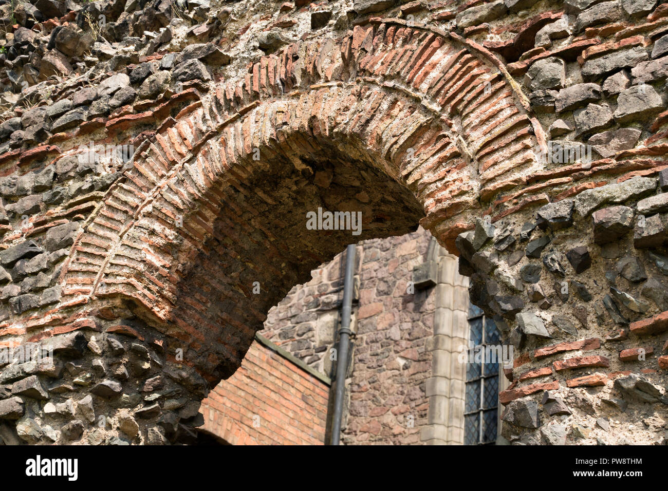 Roman arch in ruined wall of Roman Baths, Jewry Wall Museum, Leicester, England, UK Stock Photo