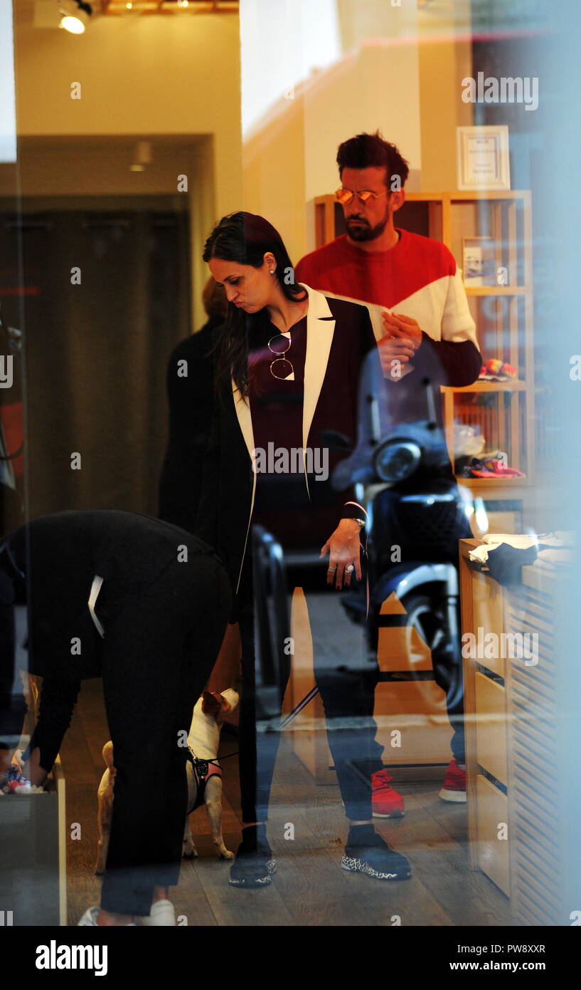 Milan, Nicolas Spolli and family shopping in the center Nicolas Spolli, the Argentine defender of GENOA, arrives in the center with his wife ANGELA and his daughter born a few months ago. After a long walk in Via Montenapoleone decide to enter from the 'IL GUFO' a shop specializing in the sale of clothes for children and babies and shopping. Stock Photo