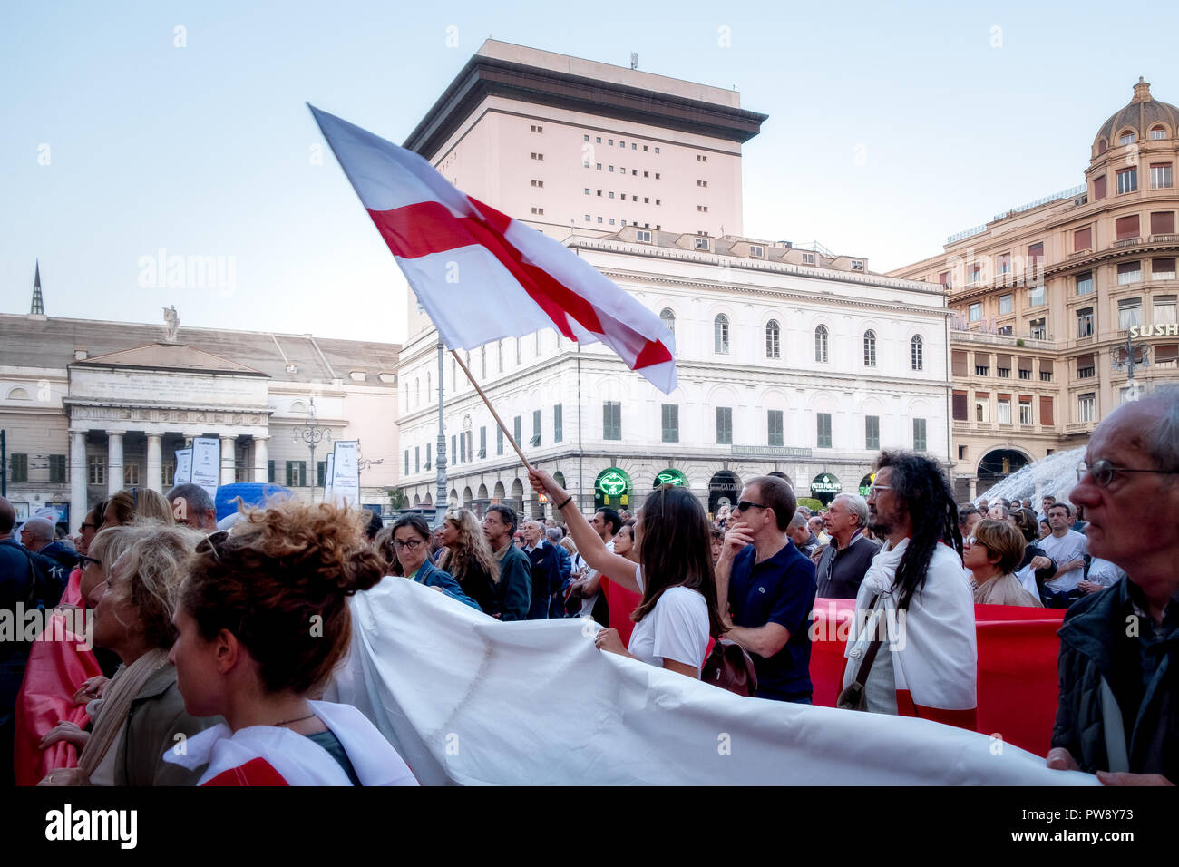 Genoa, Italy. 13th October, 2018. Demonstration by the citizens of Genoa, two months after the collapse of the Morandi bridge, asking for more help and more attention from the entire civil and political world to solve the great problems of the population. Genoa, Italy. © Emanuele Dello Strologo / Awakening / Alamy Live News Stock Photo