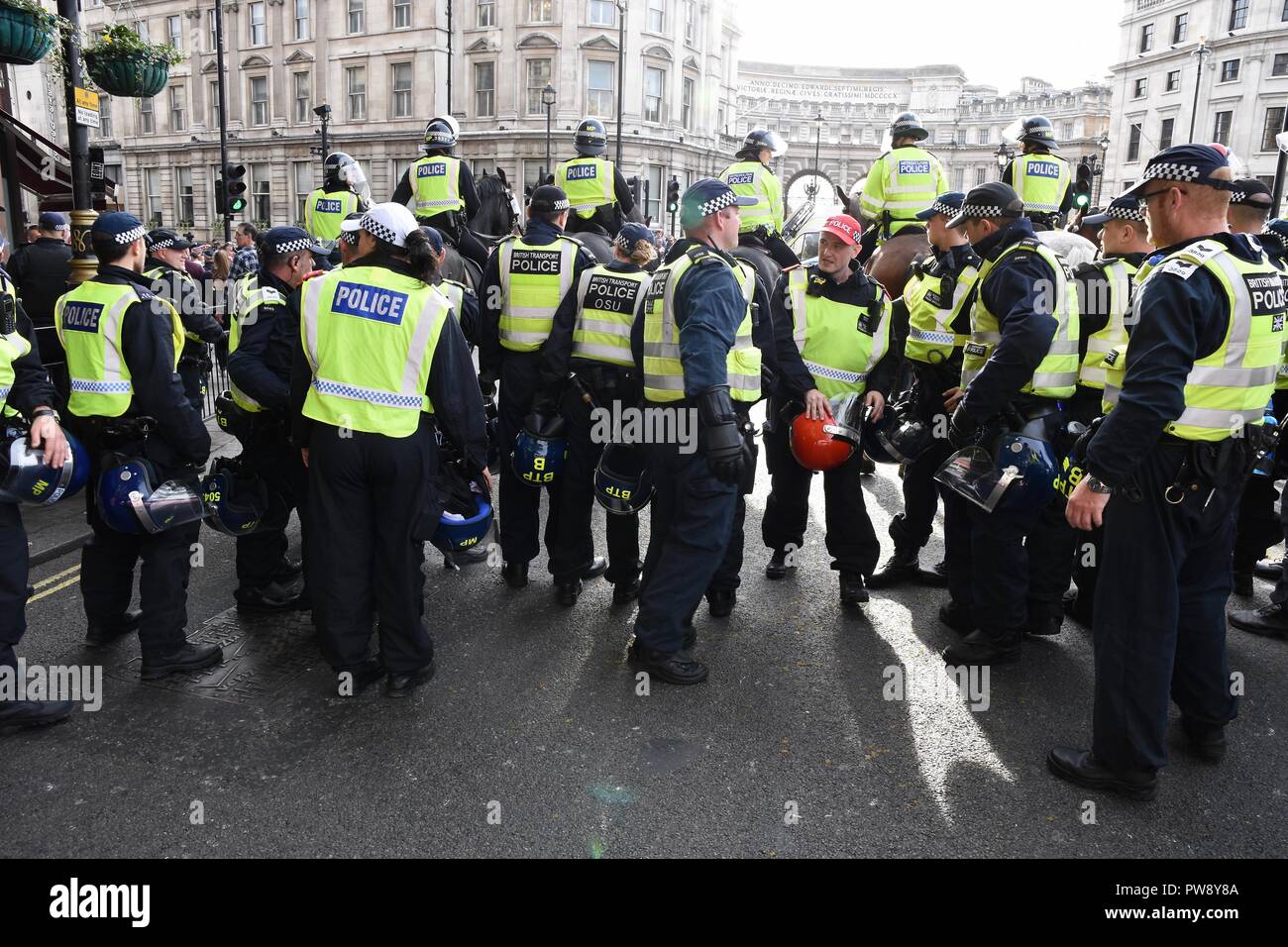 13th October 2018. Democratic Football Lads Alliance March,Police formed a barrier to keep rival groups the DFLA and anti fascists apart, Trafalgar Square,London.UK Credit: michael melia/Alamy Live News Stock Photo