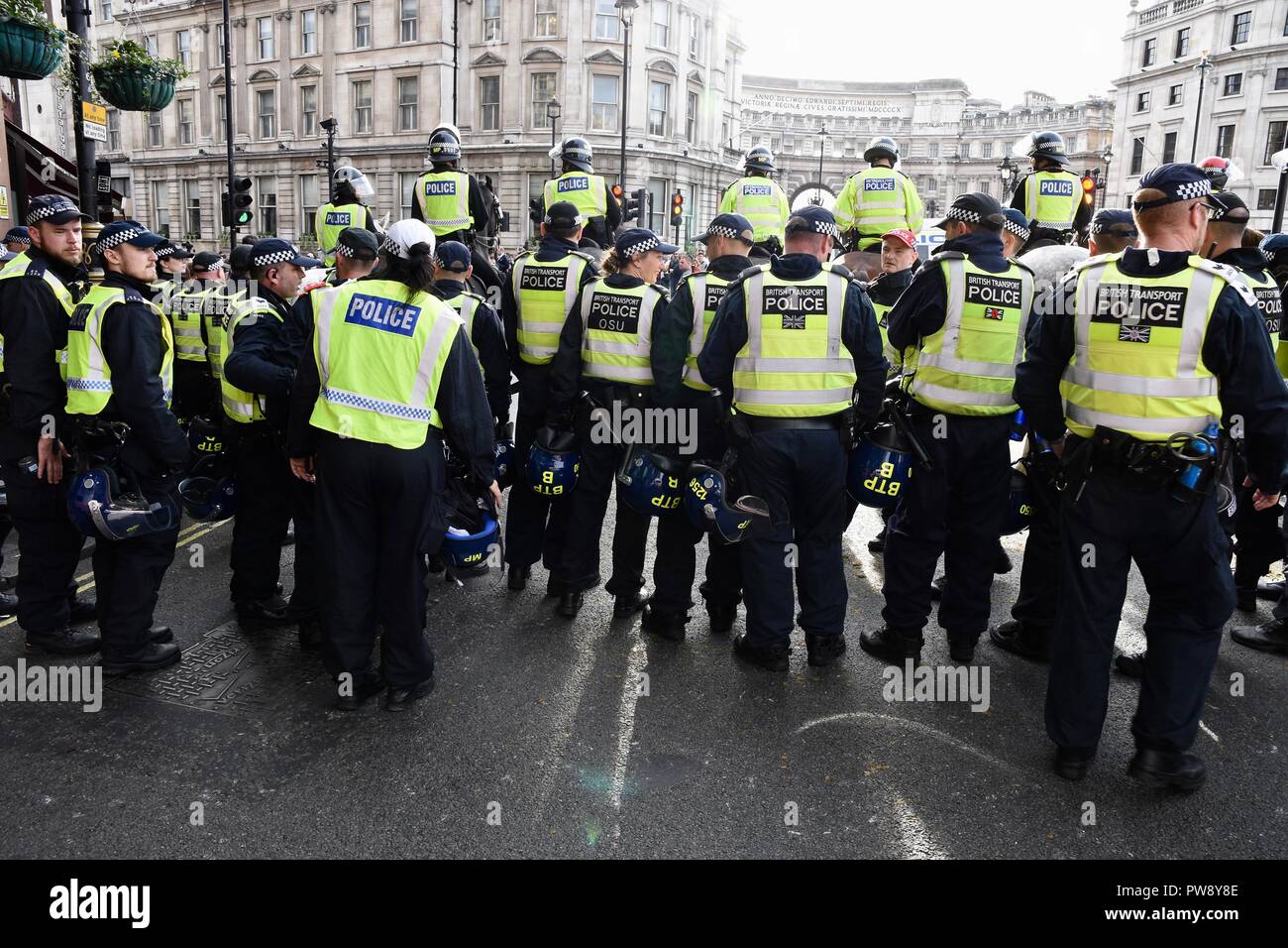 13th October 2018.Democratic Football Lads Alliance March, The Police formed a barrier to keep rival groups the DFLA and anti fascists apart,Trafalgar Square,London.UK Credit: michael melia/Alamy Live News Stock Photo