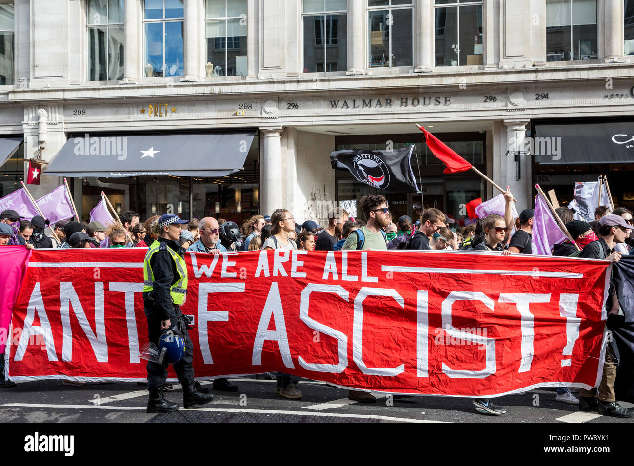 London, UK. 13th October, 2018. Anti-fascist groups including many women from the Feminist Anti-Fascist Assembly march through London in protest against a demonstration by the far-right Democratic Football Lads Alliance (DFLA). Anti-racist groups also held a Unity demonstration to coincide with the DFLA demonstration. Credit: Mark Kerrison/Alamy Live News Stock Photo