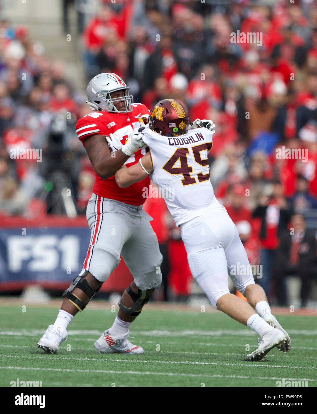 Columbus, Ohio, USA. 13th Oct, 2018. offensive lineman Thayer Munford (75) of the Ohio State Buckeyes blocking defensive back Josh Aune (49) of the Minnesota Golden Gophers at the NCAA football game between the Minnesota Golden Gophers & Ohio State Buckeyes at Ohio Stadium in Columbus, Ohio. JP Waldron/Cal Sport Media/Alamy Live News Stock Photo