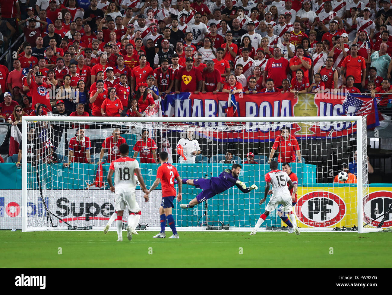 Miami Gardens, Florida, USA. 12th Oct, 2018. Chile goalkeeper FERNANDO DE PAUL (12) leaps to save a shot to goal during an international friendly match between the Peru and Chile national soccer teams, at the Hard Rock Stadium in Miami Gardens, Florida. Credit: Mario Houben/ZUMA Wire/Alamy Live News Stock Photo
