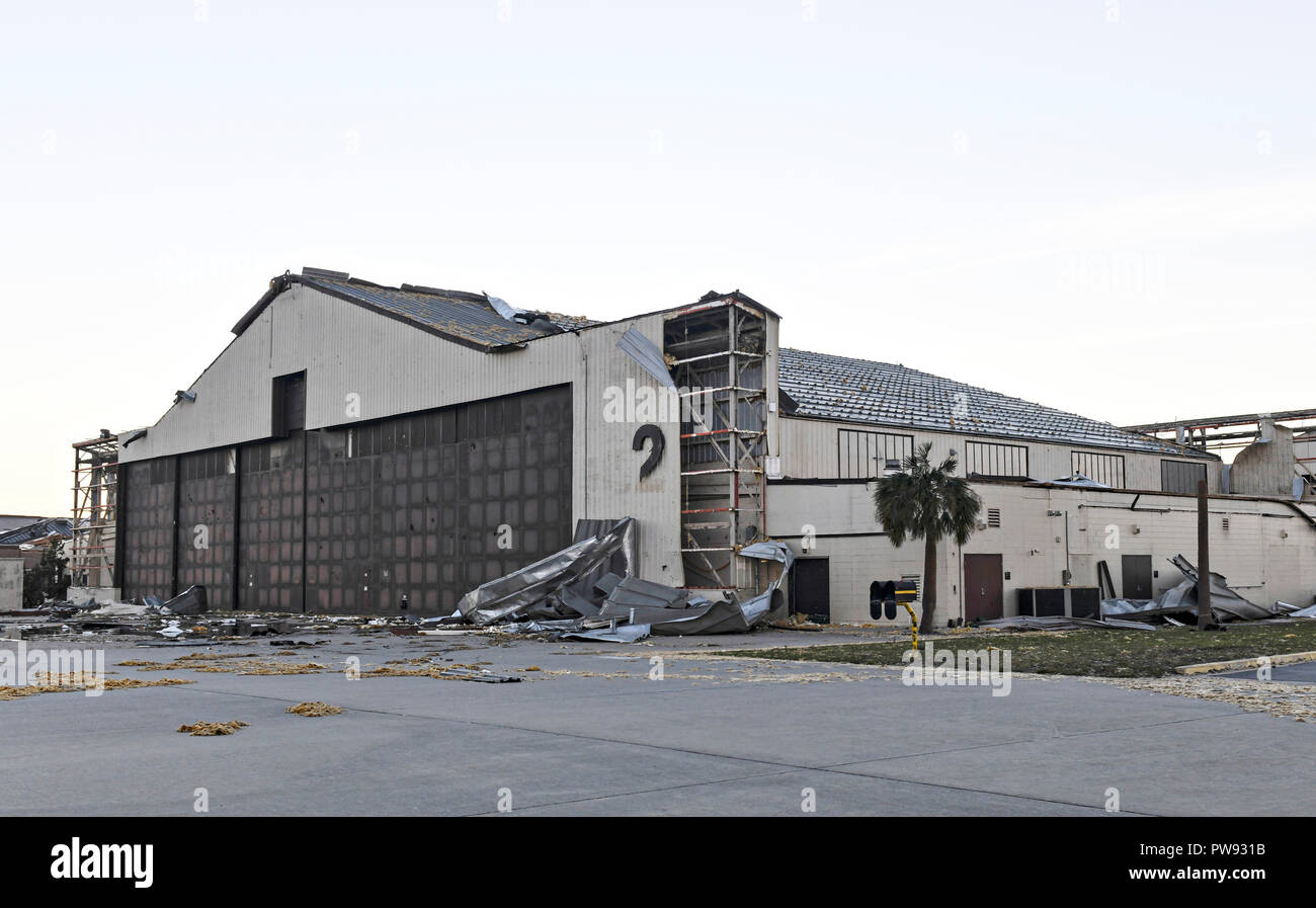 Damage to aircraft hangers at Tyndall Air Force Base in the aftermath of Hurricane Michael as the storm left a swath of destruction across the Panhandle region of Florida area October 12, 2018 near Panama City, Florida. The Category 4 monster storm killed at least 6 people ad left behind catastrophic damage along northwestern Florida. Stock Photo
