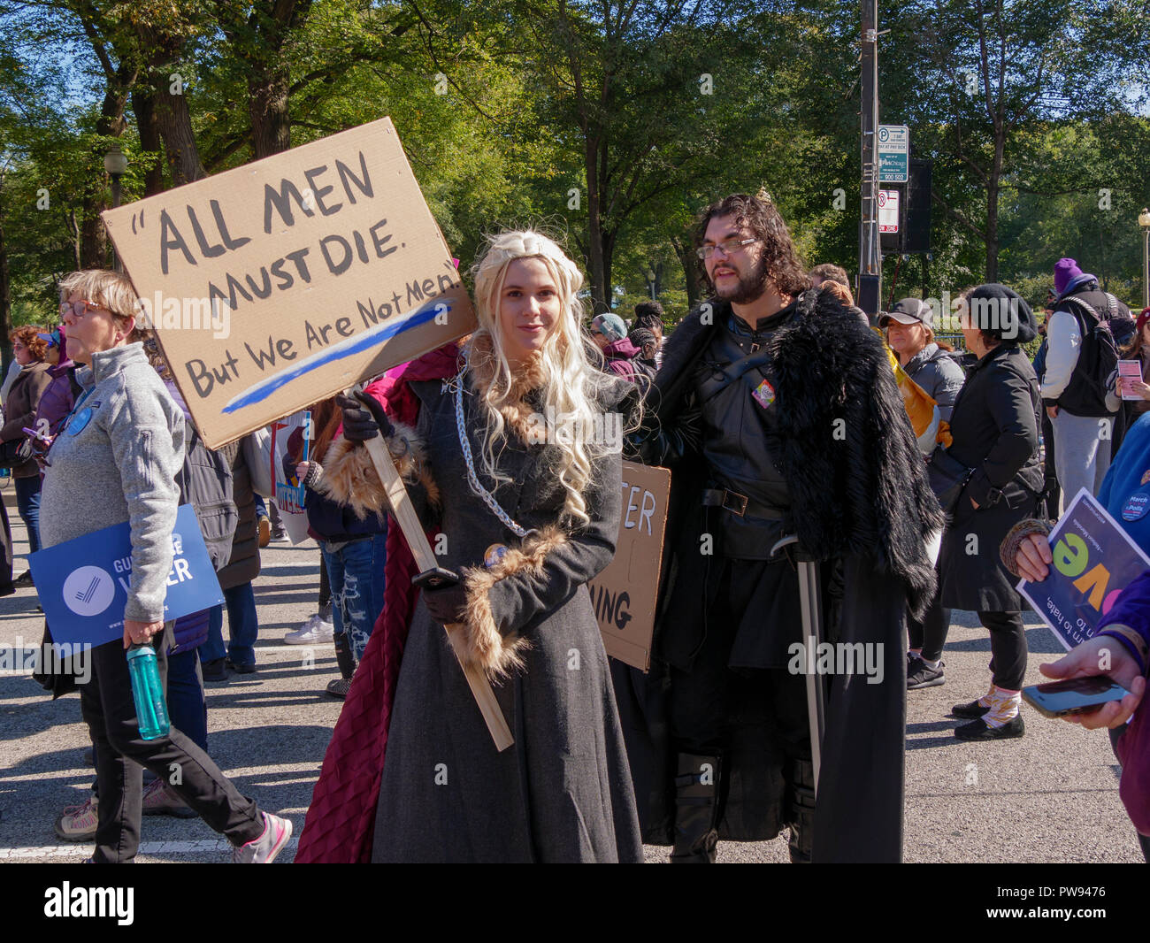 Chicago, Illinois, USA. 13th October 2018. Protesters costumed as Daenerys Targaryen and John Snow from the television show 'Game of Thrones' at today's women's rally. Credit: Todd Bannor/Alamy Live News Stock Photo