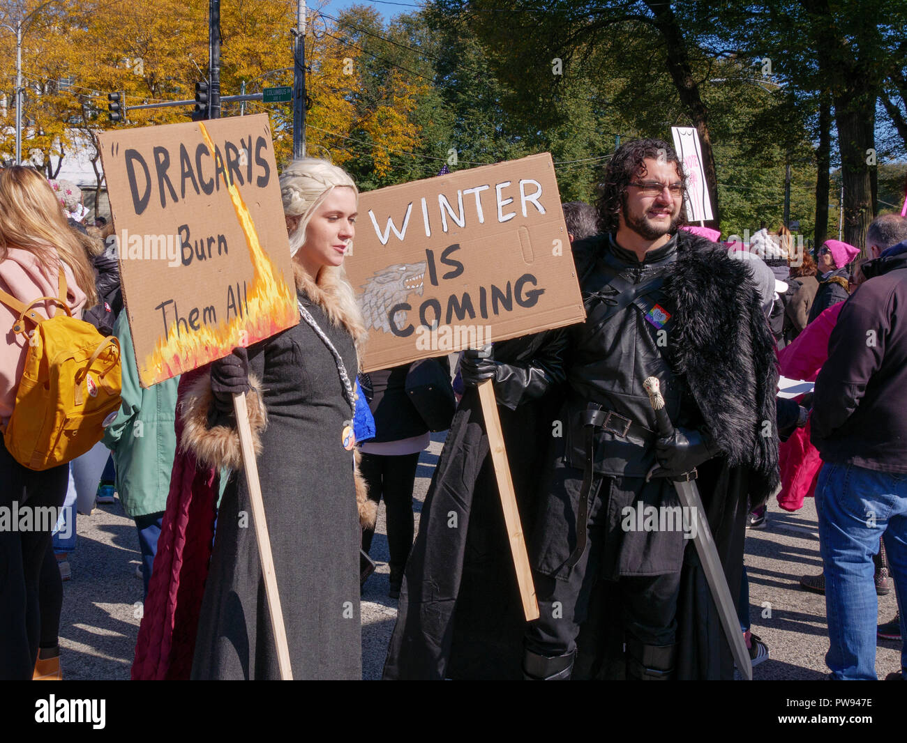 Chicago, Illinois, USA. 13th October 2018. Protesters costumed as Daenerys Targaryen and John Snow from the television show 'Game of Thrones' at today's women's rally. Credit: Todd Bannor/Alamy Live News Stock Photo