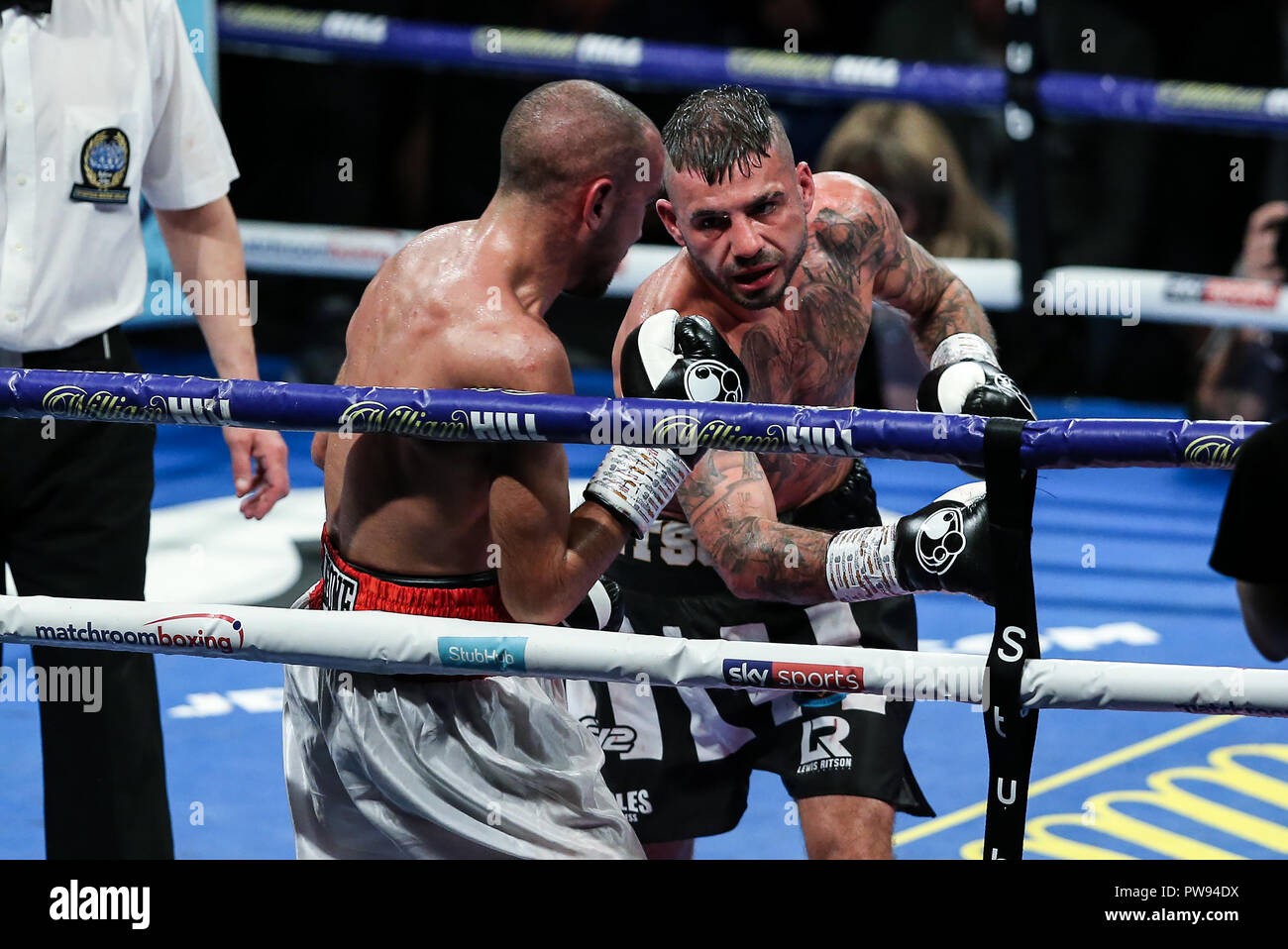 Metro Radio Arena, Newcastle, UK. Saturday 13th October 2018. Lewis Ritson lands a punch on Francesco Patera during a fight for the vacant EBU European Lightweight title. Stock Photo
