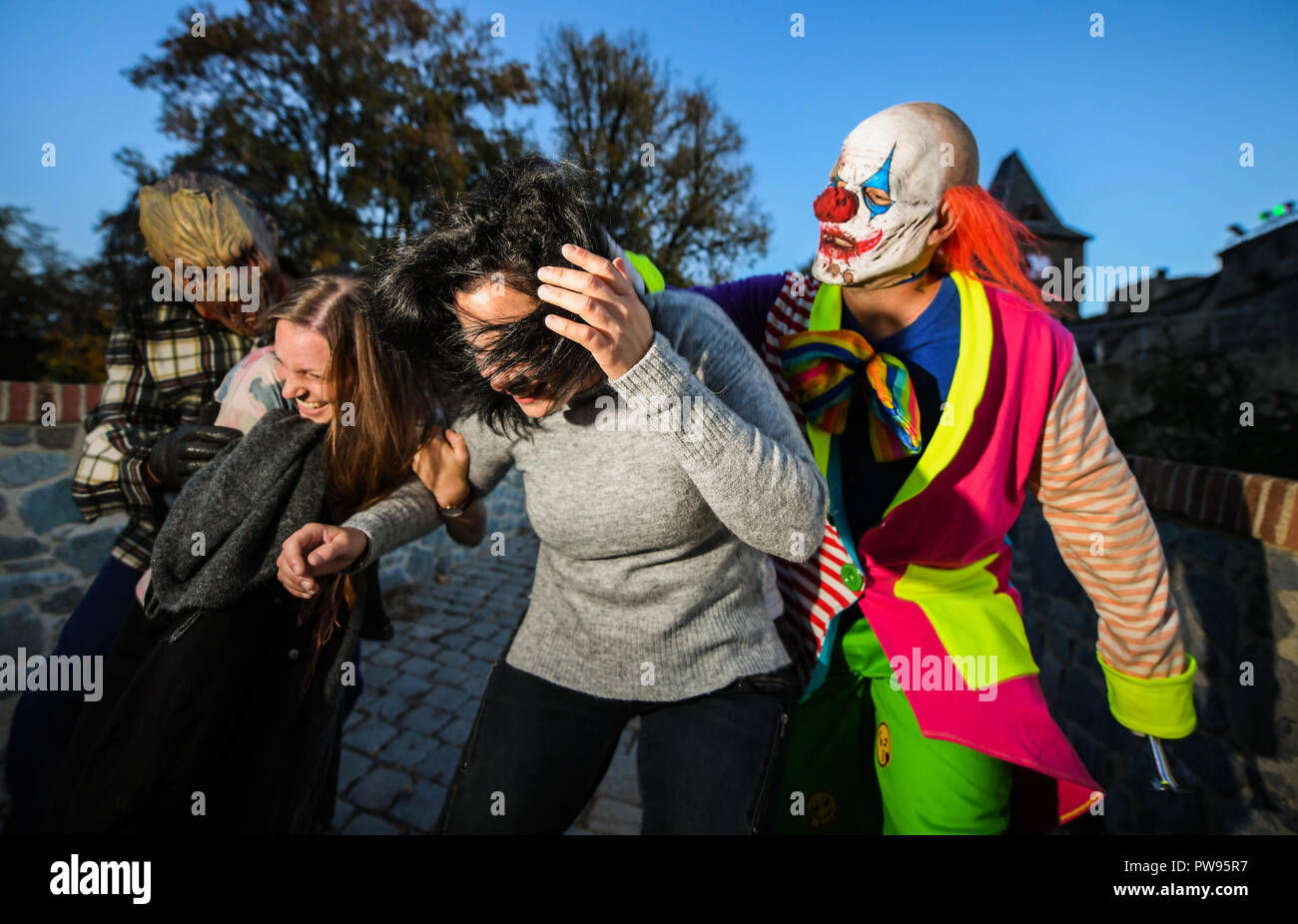 Muehltal Hessen 13th Oct 2018 During The Dress Rehearsal Two Visitors Are Followed By A Horror Clown And A Scarred Face Since The 1970s Burg Frankenstein Has Hosted One Of The Largest