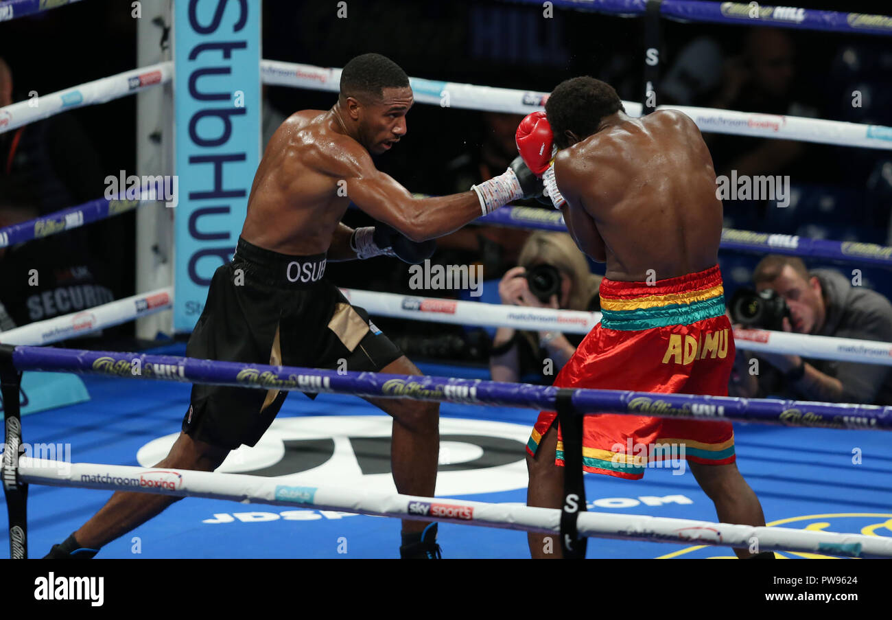 Lawrence Osueke lands a right hand on Charles Adamu during the boxing fight at Metro Radio Arena, Newcastle, UK. Picture date: 13th October 2018. Picture credit should read: James Wilson Credit: UK Sports Agency/Alamy Live News Stock Photo