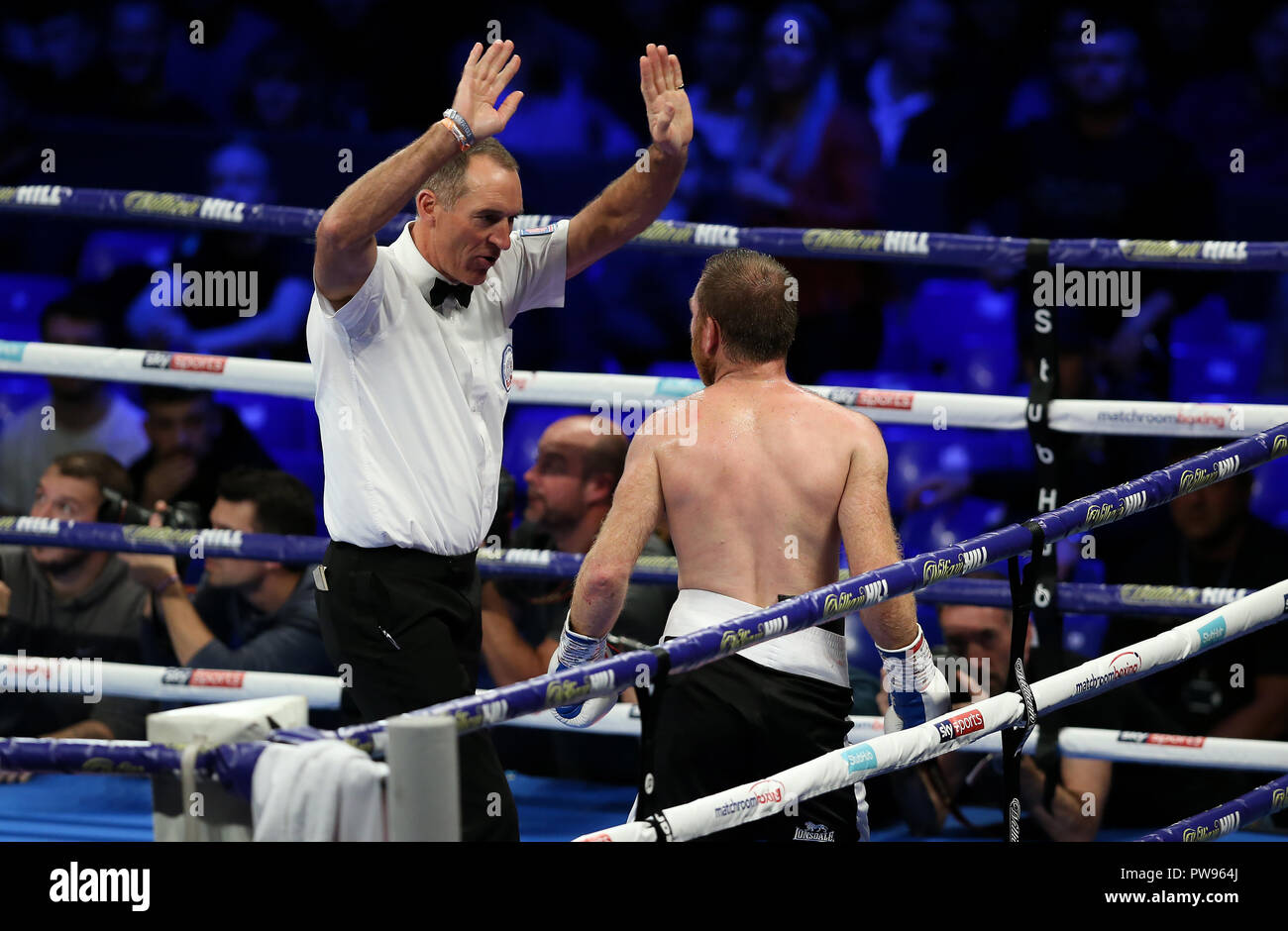 Metro Radio Arena, Newcastle, UK. Saturday 13th October 2018. Anthony Fowler wins after the referee deems Gabor Gorbics not fit to continue during the boxing fight at Metro Radio Arena, Newcastle, UK. Credit: UK Sports Agency/Alamy Live News Stock Photo