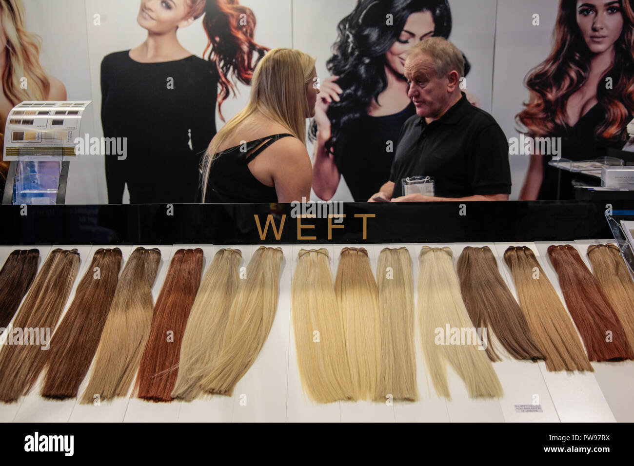 London UK 14 October 2018 Salon International presenting Australian Fame  Team ,using salt and minerals to colour and highlight the hair at the UK's  biggest hairdressing event with over 400 brands including